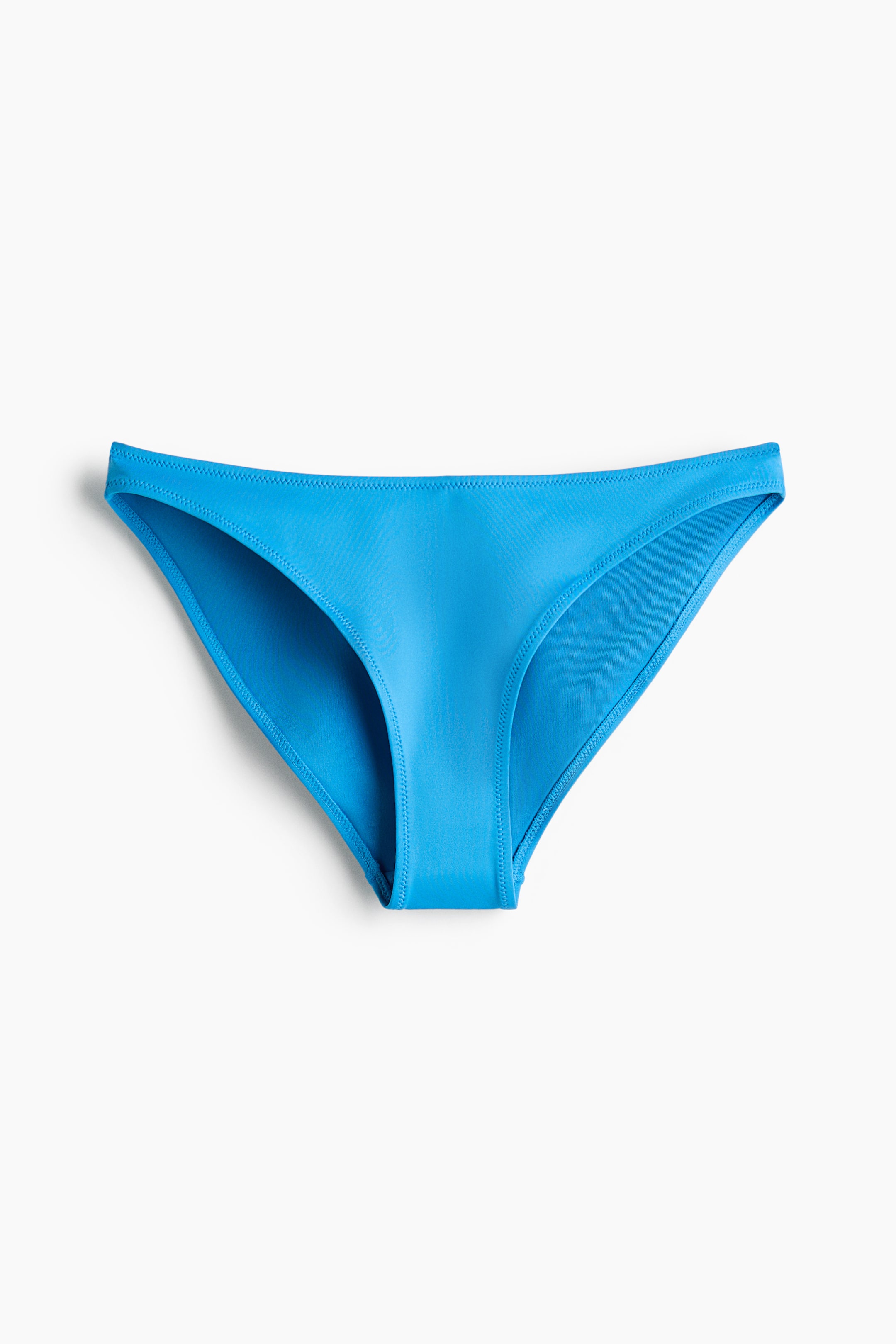 View larger image: Fully lined bikini bottoms featuring a mid-rise waist and moderate back coverage are presented from the front. The blue material showcases a sleek texture, with distinct stitching accentuating the leg openings and waistband.
