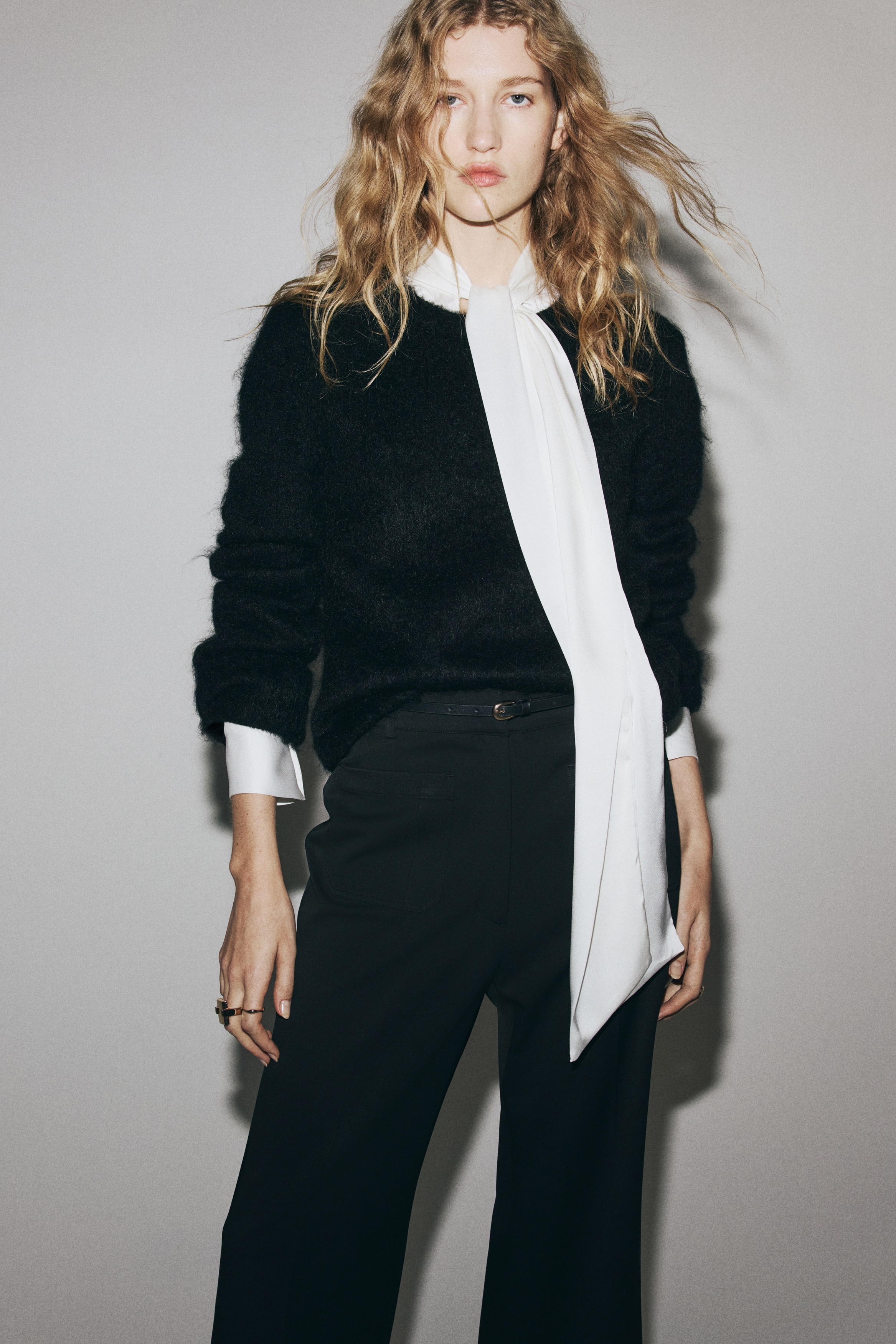 Flared belted trousers
