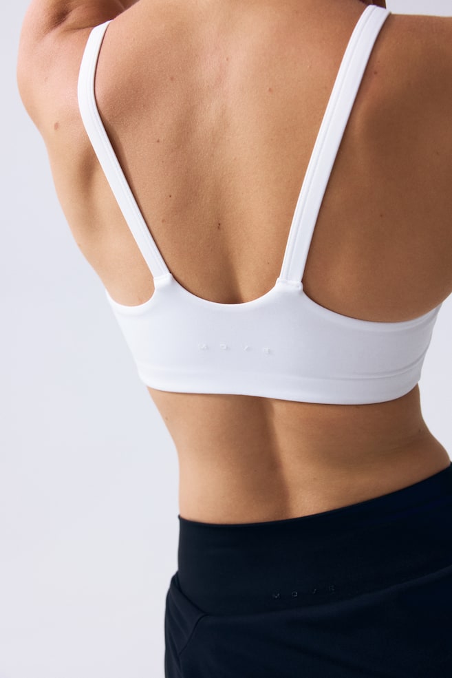 Medium Support Sports bra with SoftMove™ - White/Black/Warm brown/Antique rose/Lilac/Light maroon/Navy blue/Frosty lilac/Butter yellow/Black/Coffee bean brown/Navy blue - 3