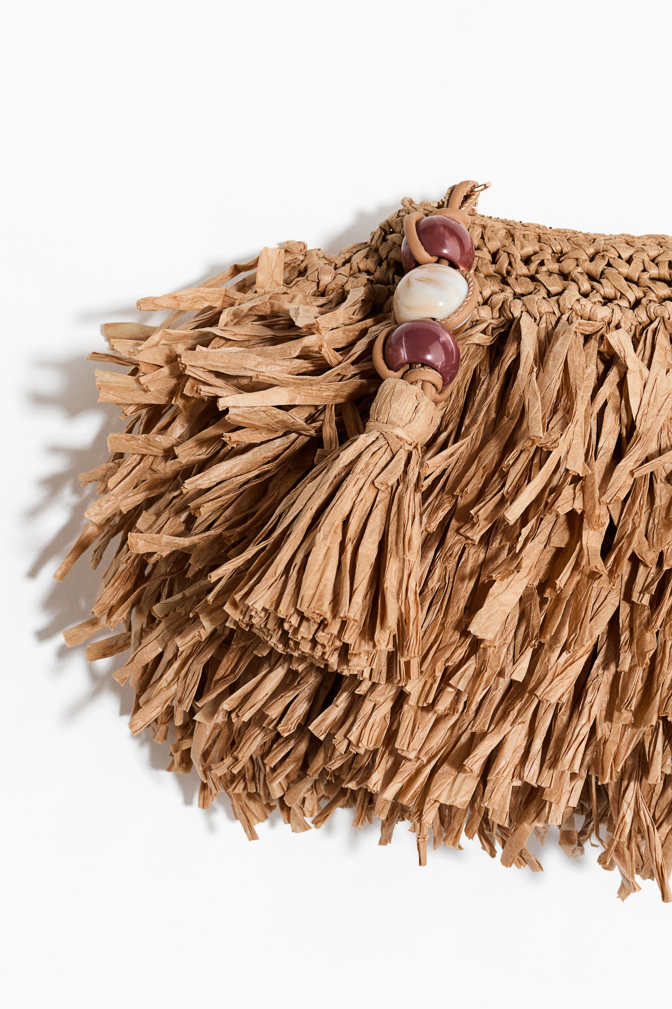 Pochette frangée en paille