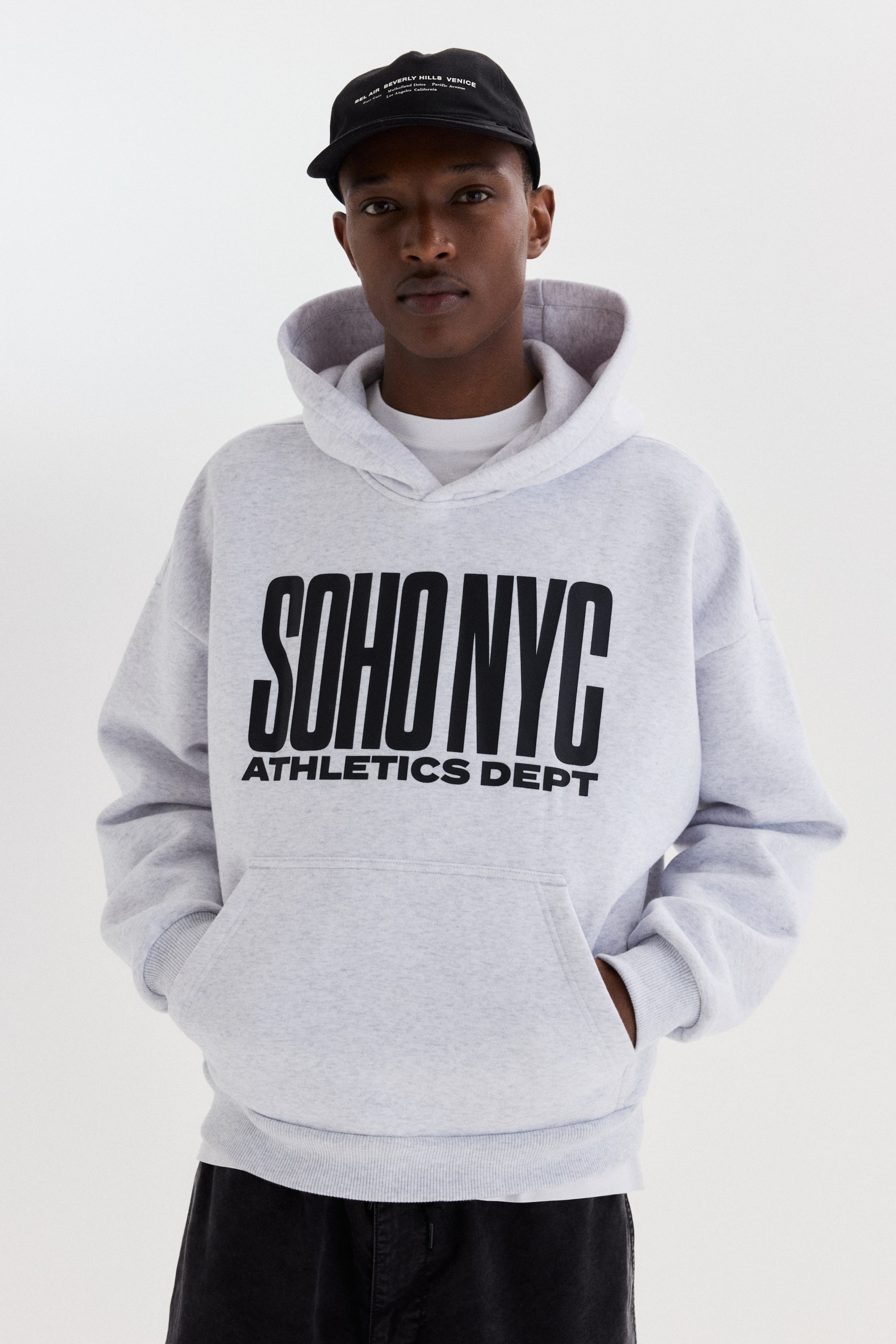 Ver imagen más grande: Sudadera con capucha Loose Fit - Gris jaspeado/Soho NYC - HOMBRE | H&M ES 1