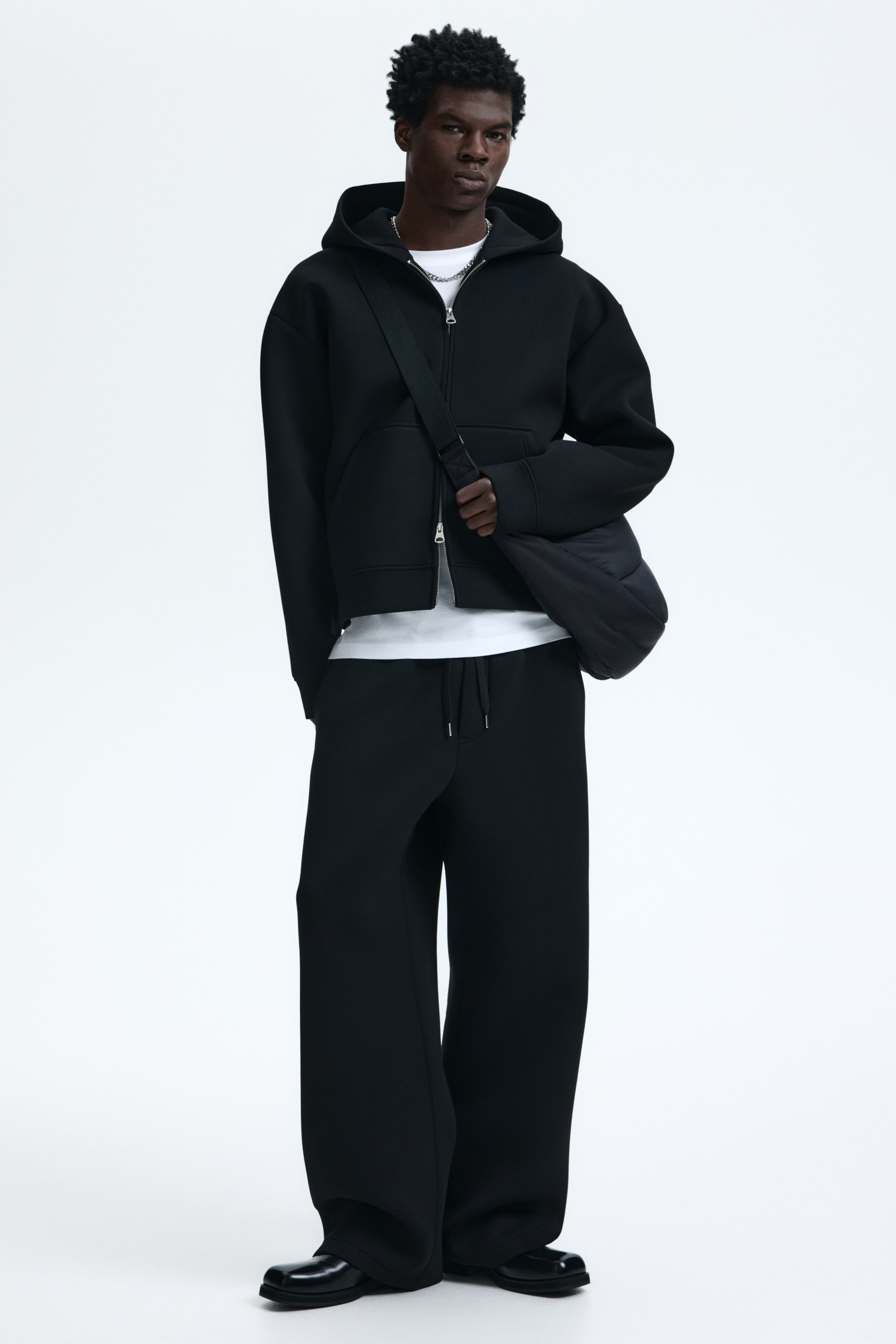 Zobraziť väčší obrázok: Športové nohavice Relaxed Fit - Čierna - MUŽI | H&M SK 1