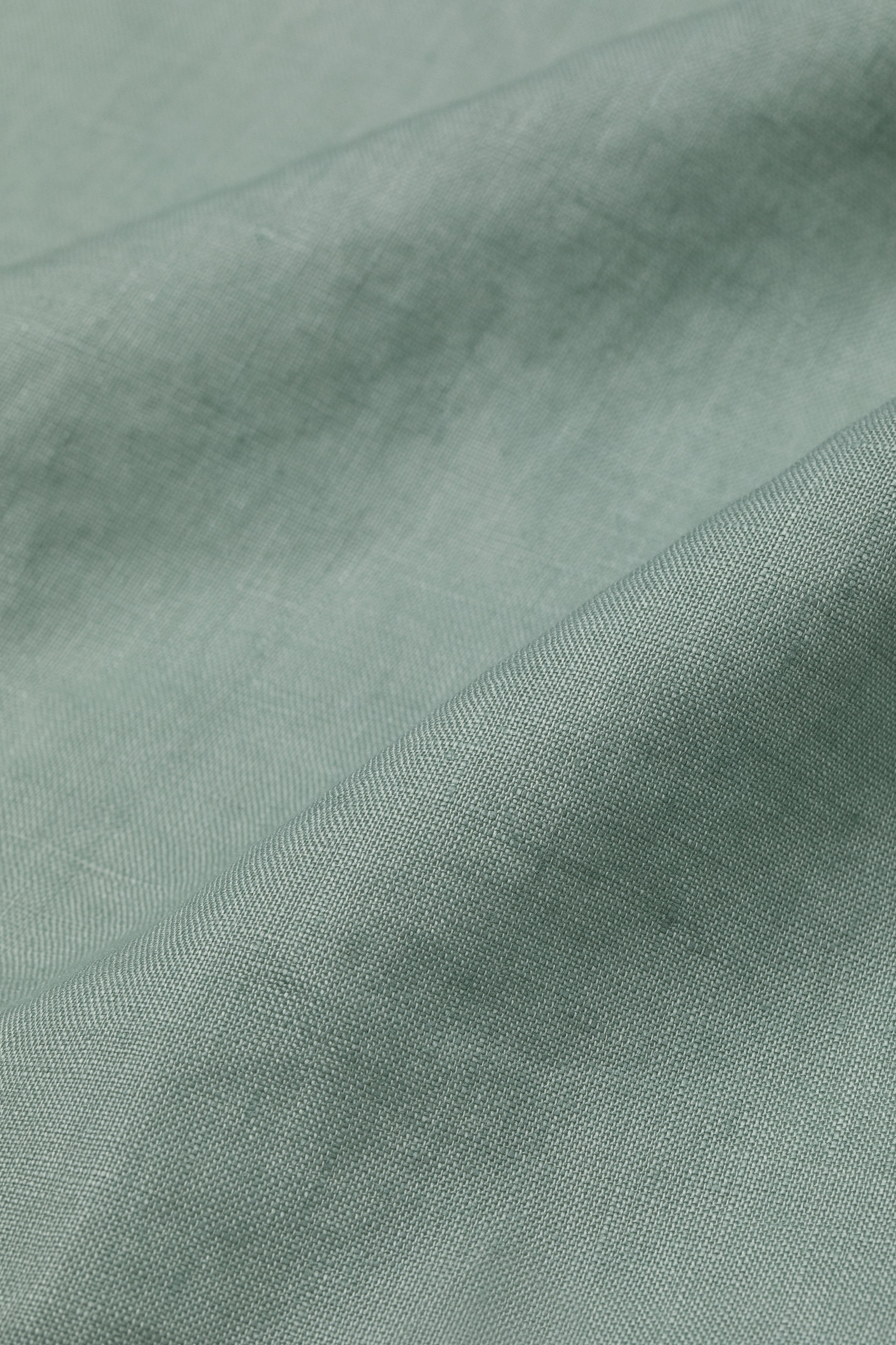 Linen apron - Sage green - Home All | H&M GB