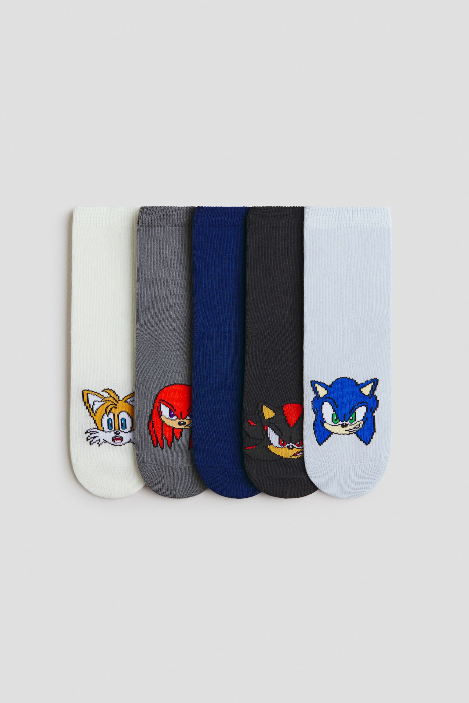 Set de 5 perechi de șosete cu motive - Albastru-închis/Ariciul Sonic/Verde/Povestea jucăriilor/Maro/Jurassic World/Albastru/mașini/Alb/Marvel Comics/Albastru/Omul-Păianjen/Light blue/Snoopy/Roșu/Mașini/Bleumarin/Mickey Mouse/Negru/Hot Wheels/Albastru/Patrula cățelușilor/Albastru-deschis/Bluey/Verde-kaki/Jurassic World/Verde-kaki/Jurassic World/Albastru/Ariciul Sonic/Albastru/Lilo & Stitch