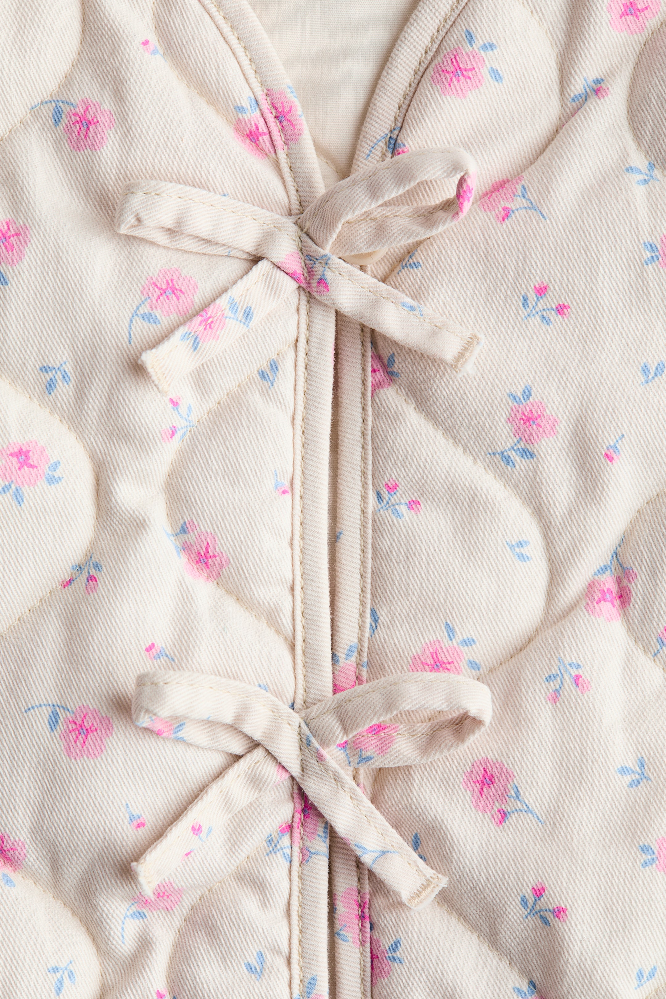 Näytä suurempi kuva: Tikattu takki - Light beige/Floral - Kids | H&M FI 2