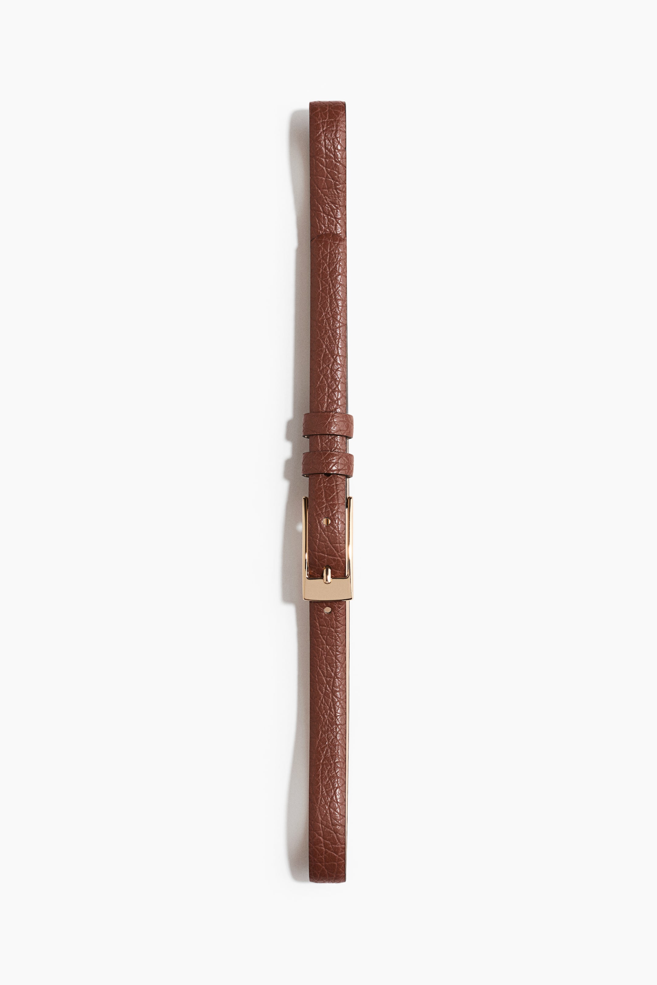 View larger image: A narrow brown coated fabric belt with a textured surface is laid flat and vertically oriented, featuring a rectangular gold-toned metal buckle with a single prong and two matching fabric keepers.