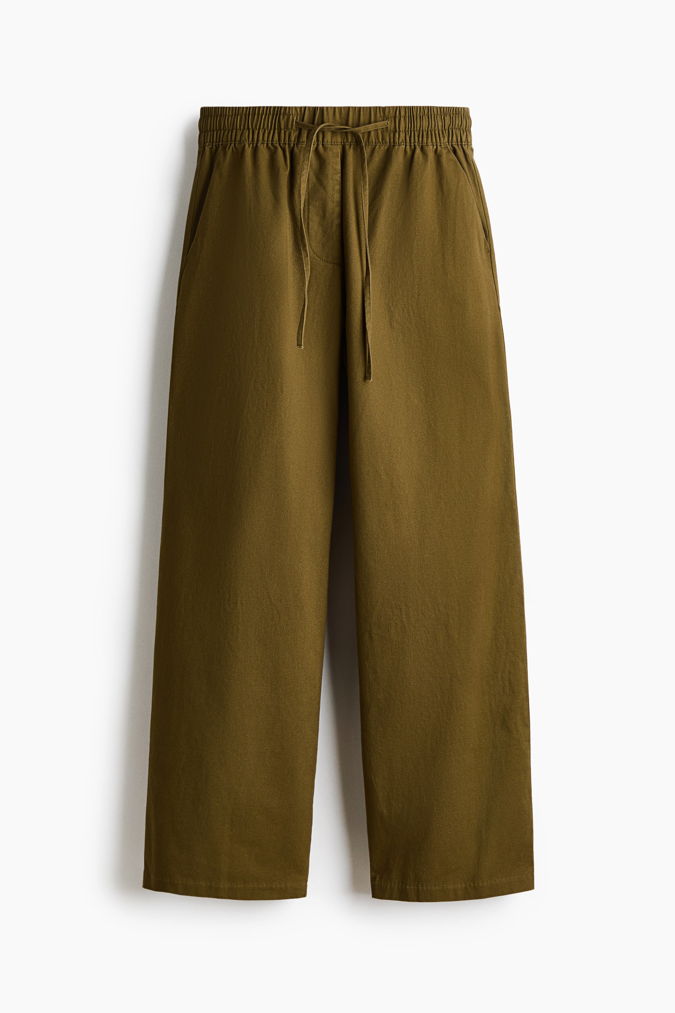 View larger image: Olive green pants are presenting a front view, featuring an elasticized drawstring waistband, visible side pockets, and a wide-leg cut.