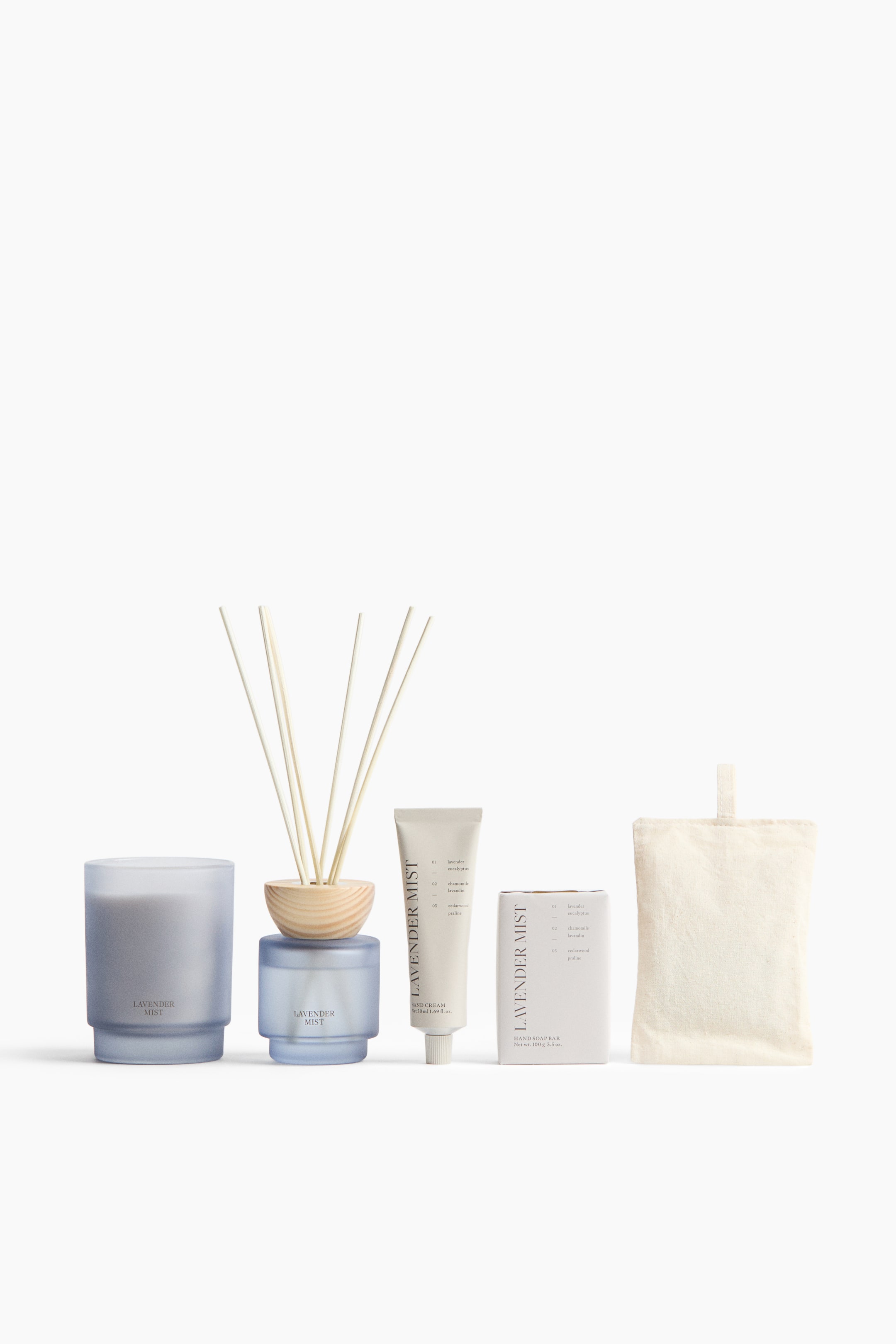 Bougie parfumée dans un pot en verre dépoli