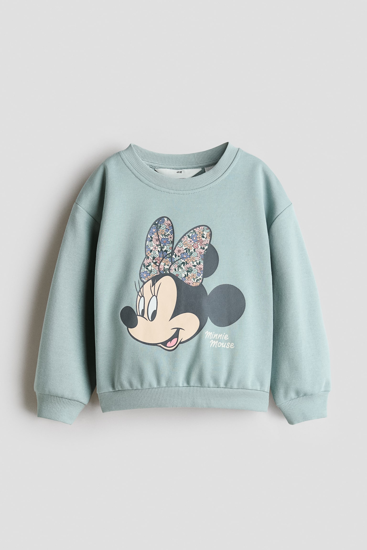 Sweatshirt mit Print und angerauter Innenseite - Türkis/Minnie Maus/Beige/Squishmallows/Rosa/Hello Kitty/Hellrosa/Pochacco/Helllila/Lilo & Stitch/Hellgrau/K Pop Demon Hunters/Mattlila/Gabby's Dollhouse/Hellrot/Hello Kitty/Hellblau/Lilo & Stitch/Graumeliert/Minnie Maus/Dunkles Mattlila/Hello Kitty/Dunkelblau/Harvard University/Weiß/Hello Kitty