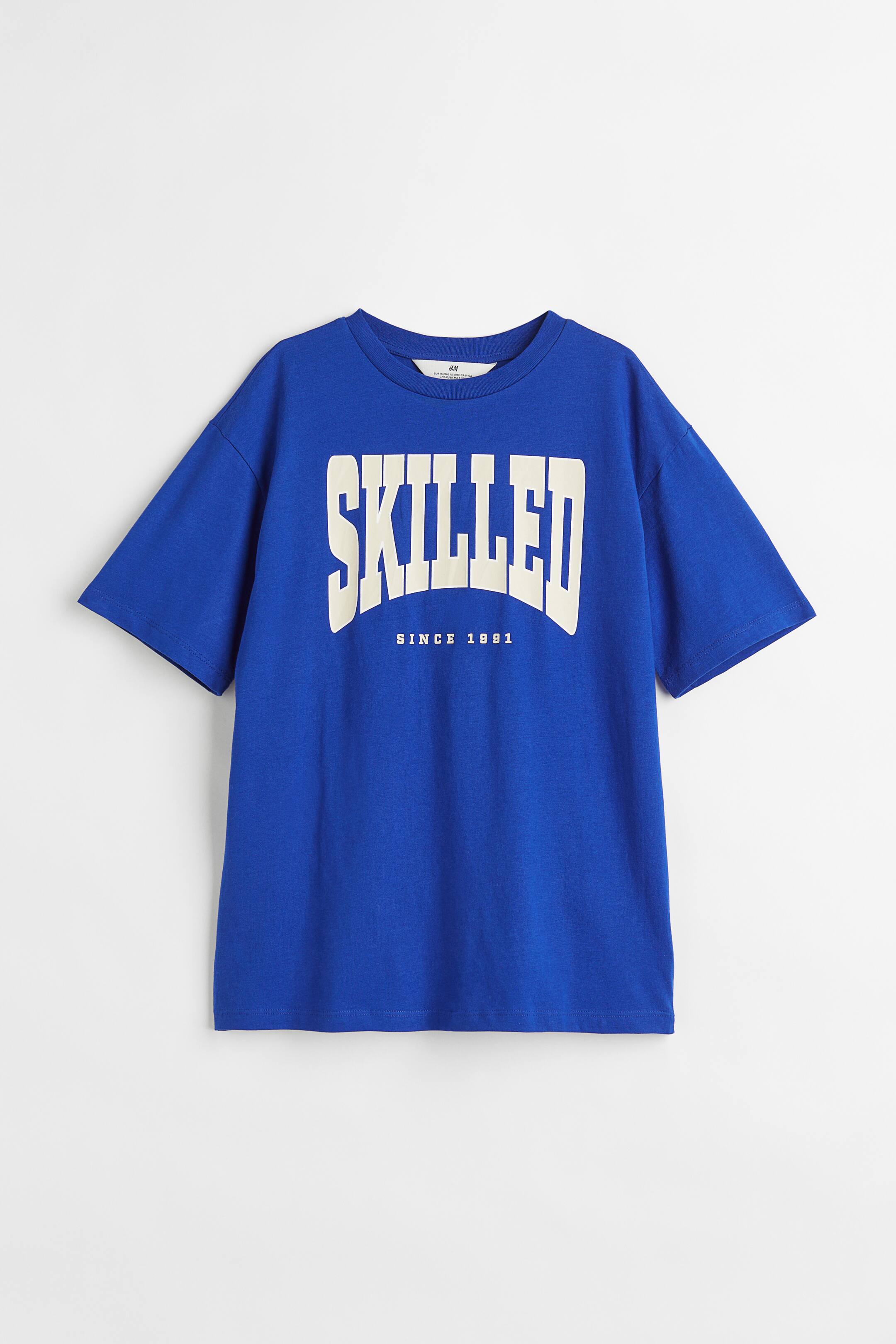 View larger image: Oversized cotton T-shirt - Blue/Skilled - Kids | H&M 1