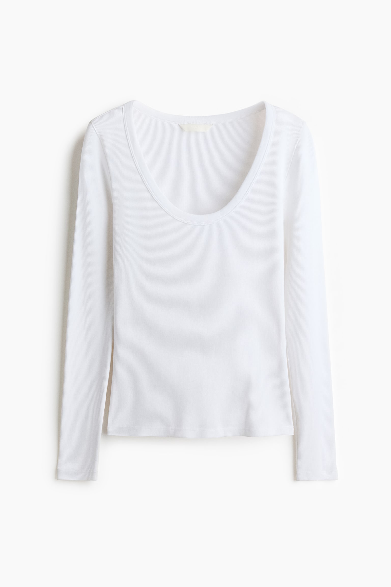 A white long-sleeved top is shown from the front, featuring a deep scoop neckline and a fine ribbed-knit texture. The top has a straight hem and fitted sleeves.