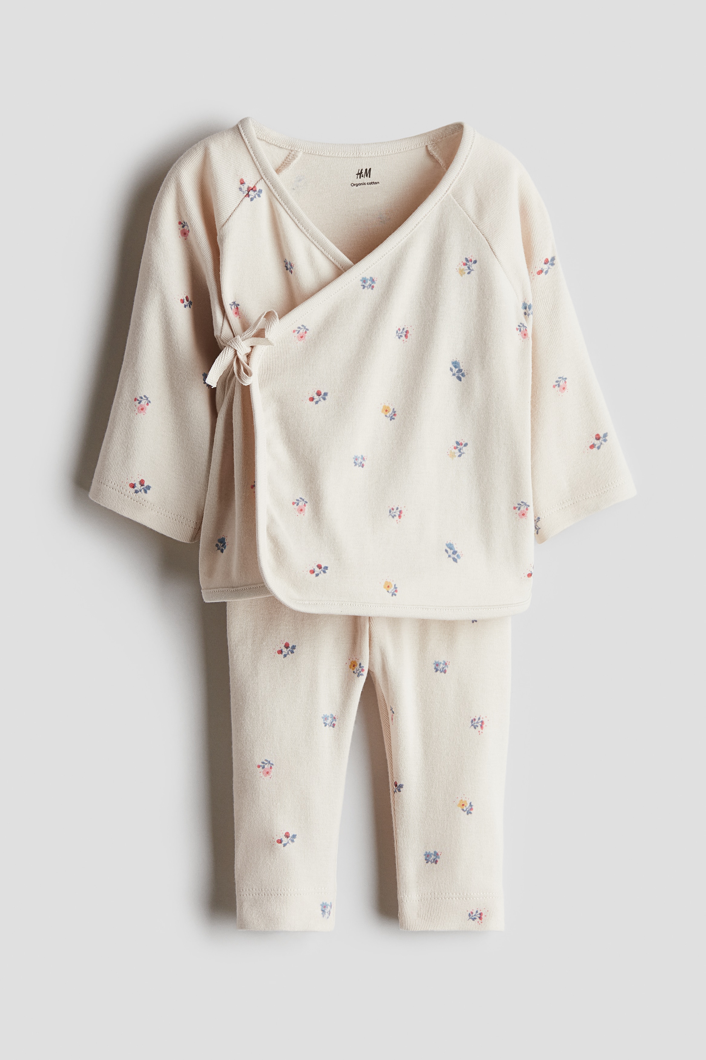 2-delt sæt med slå om-trøje og leggings - Beige/Blomstret/Hvid/Blomstret/Lys beige/Æbler/Hvid/Blomstret