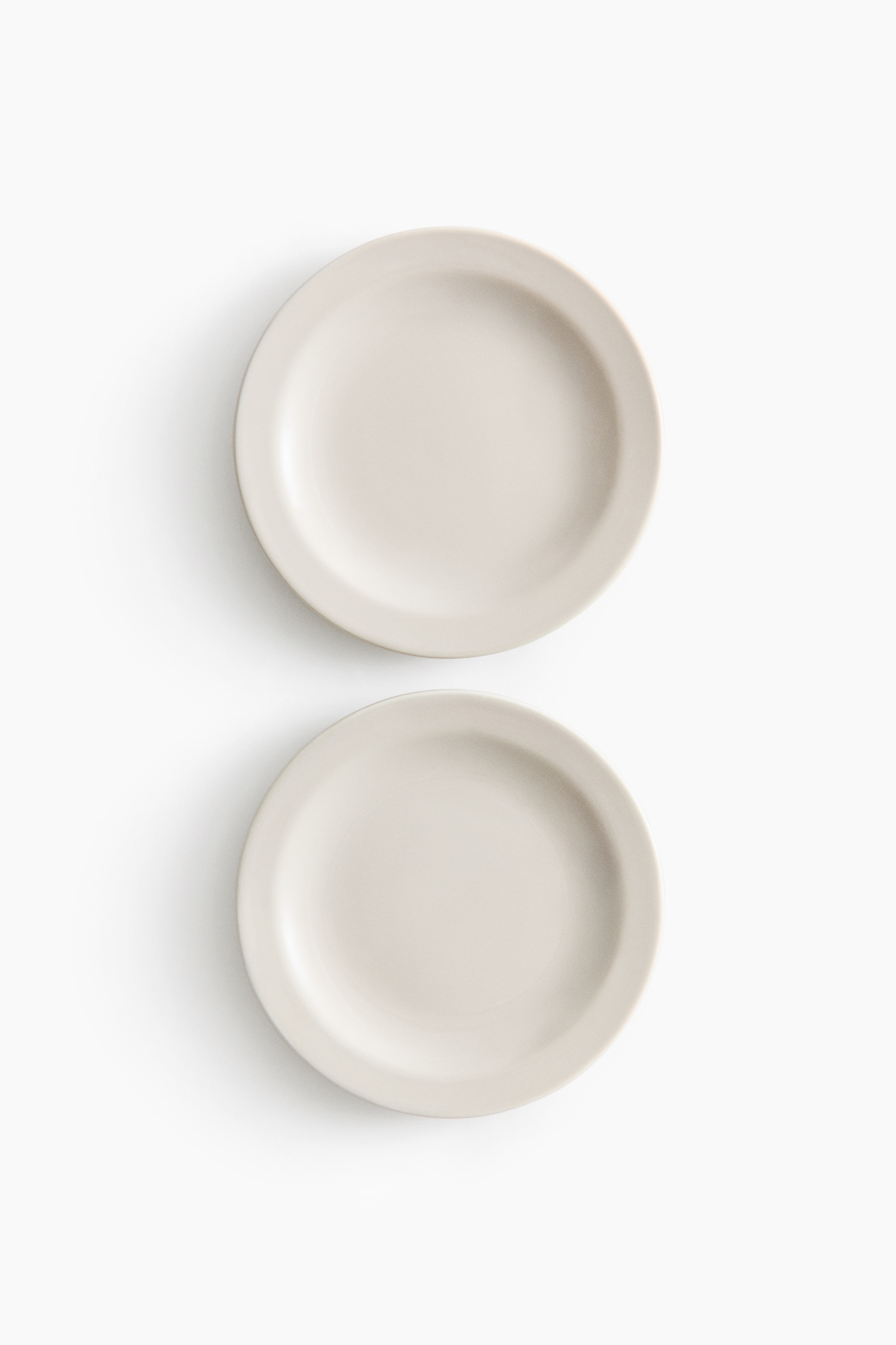 Lot de 2 petites assiettes en porcelaine