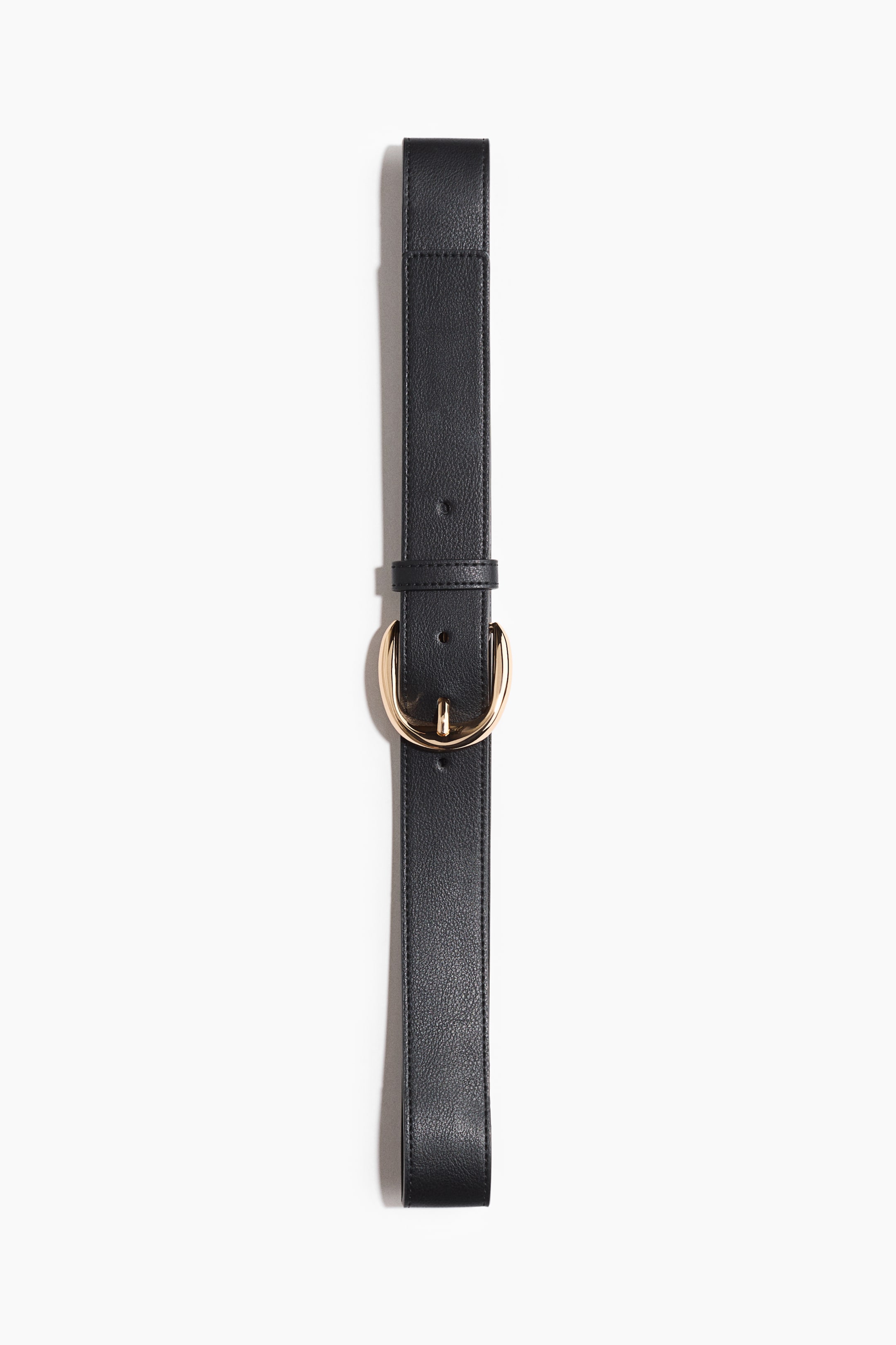 View larger image: A black belt displaying a subtle pebbled texture features a gold-toned D-shaped metal buckle with a single keeper loop, facing front.