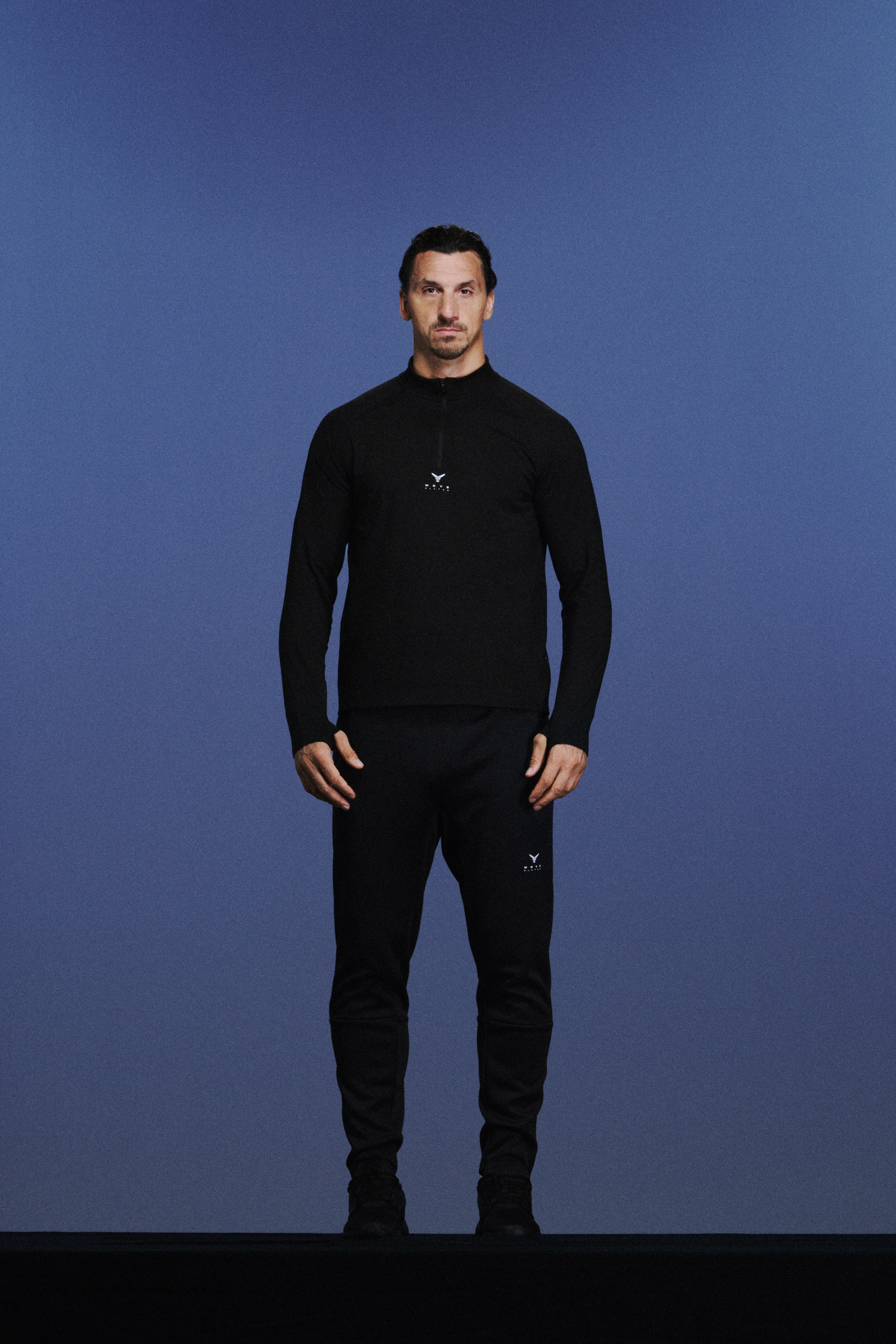 View larger image: Warming zip-top sports top with ThermoMove™ - Black/Move Zlatan - Men | H&M IE 2