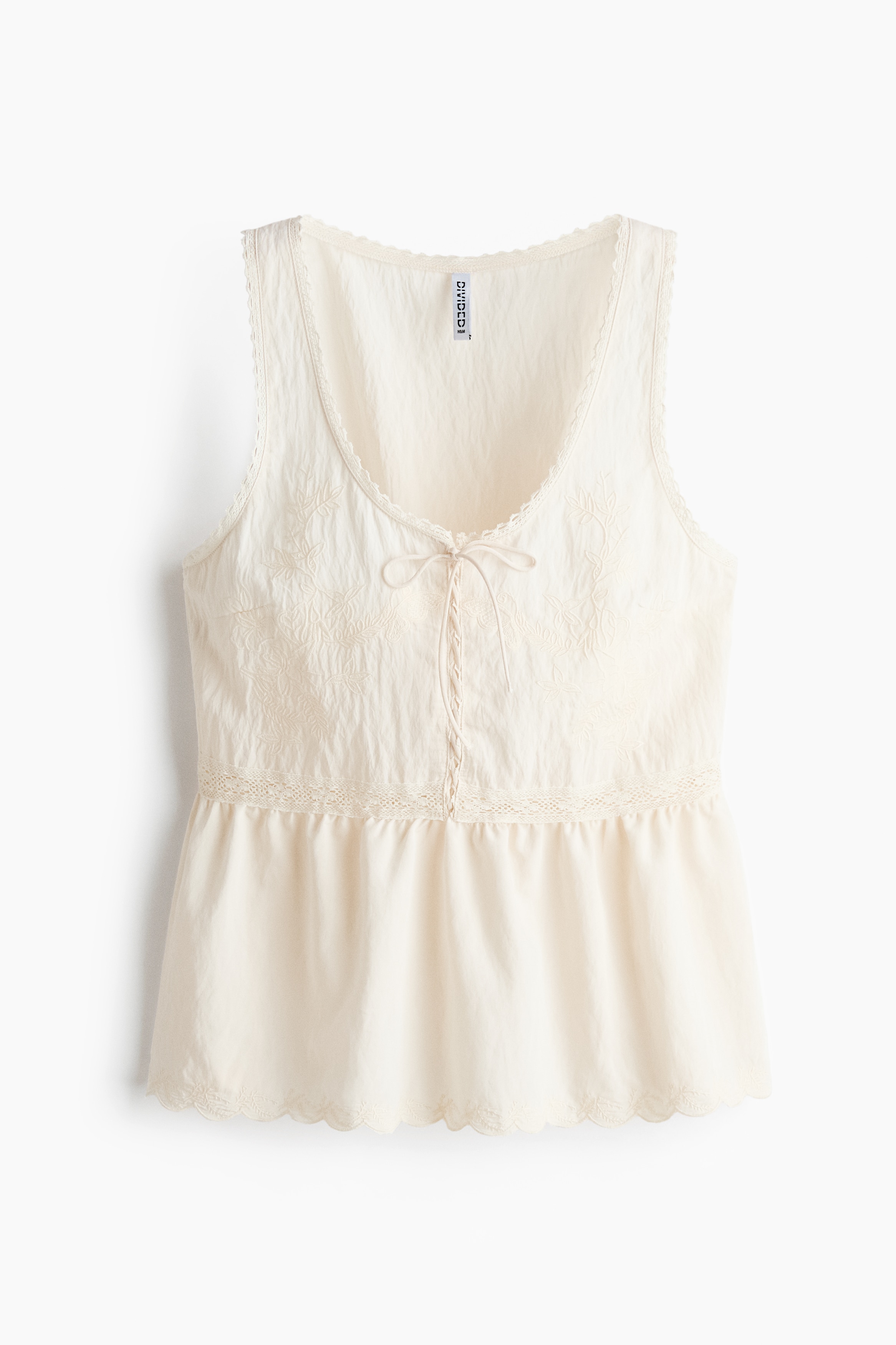 Top con peplum y lazos - Crema