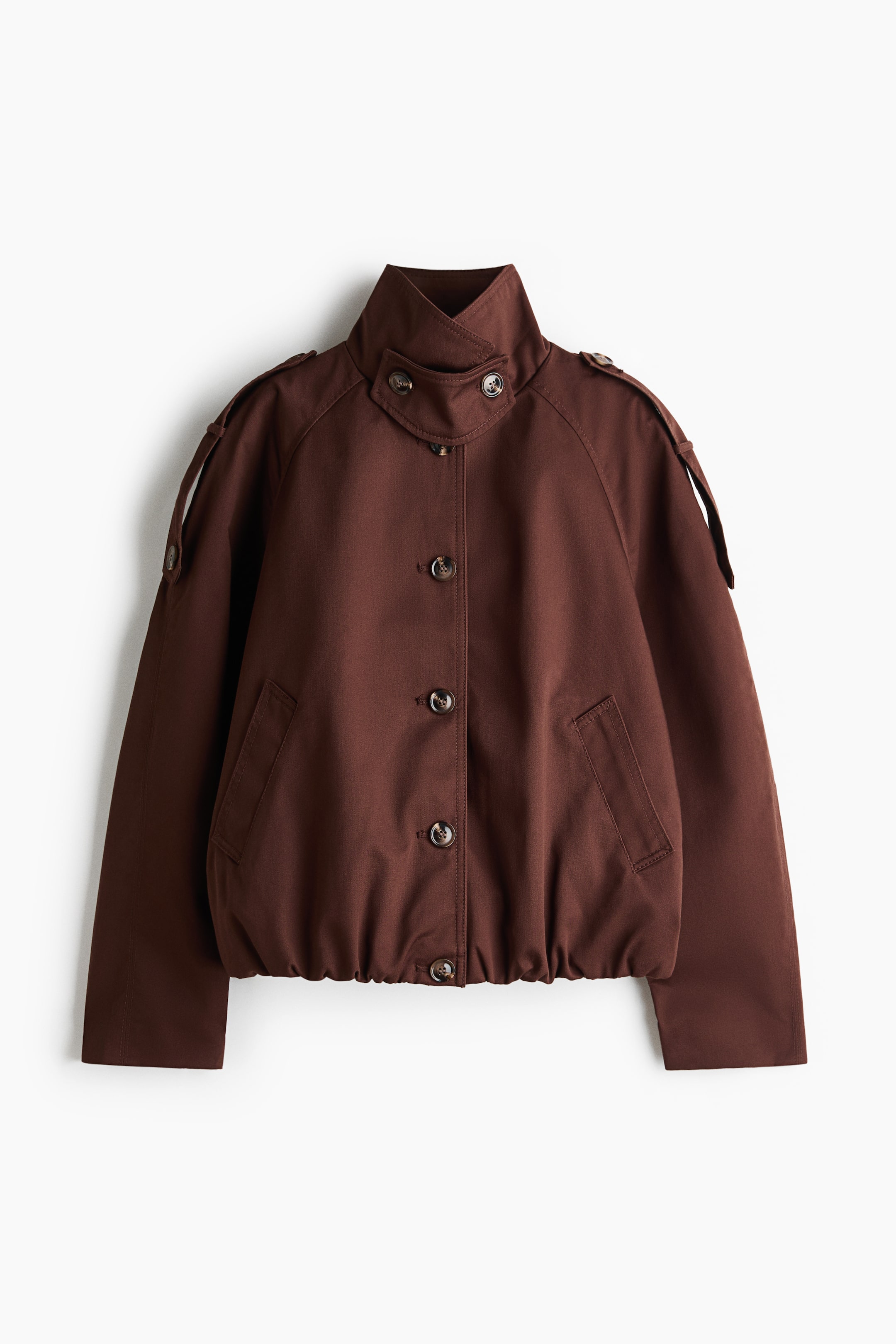 View larger image: A brown jacket is showcased at the front, featuring a stand collar with a buttoned tab closure, buttoned shoulder tabs, and a full button-front closure. Two horizontal welt pockets are visible on the lower front, and an elasticated hem completes the design.