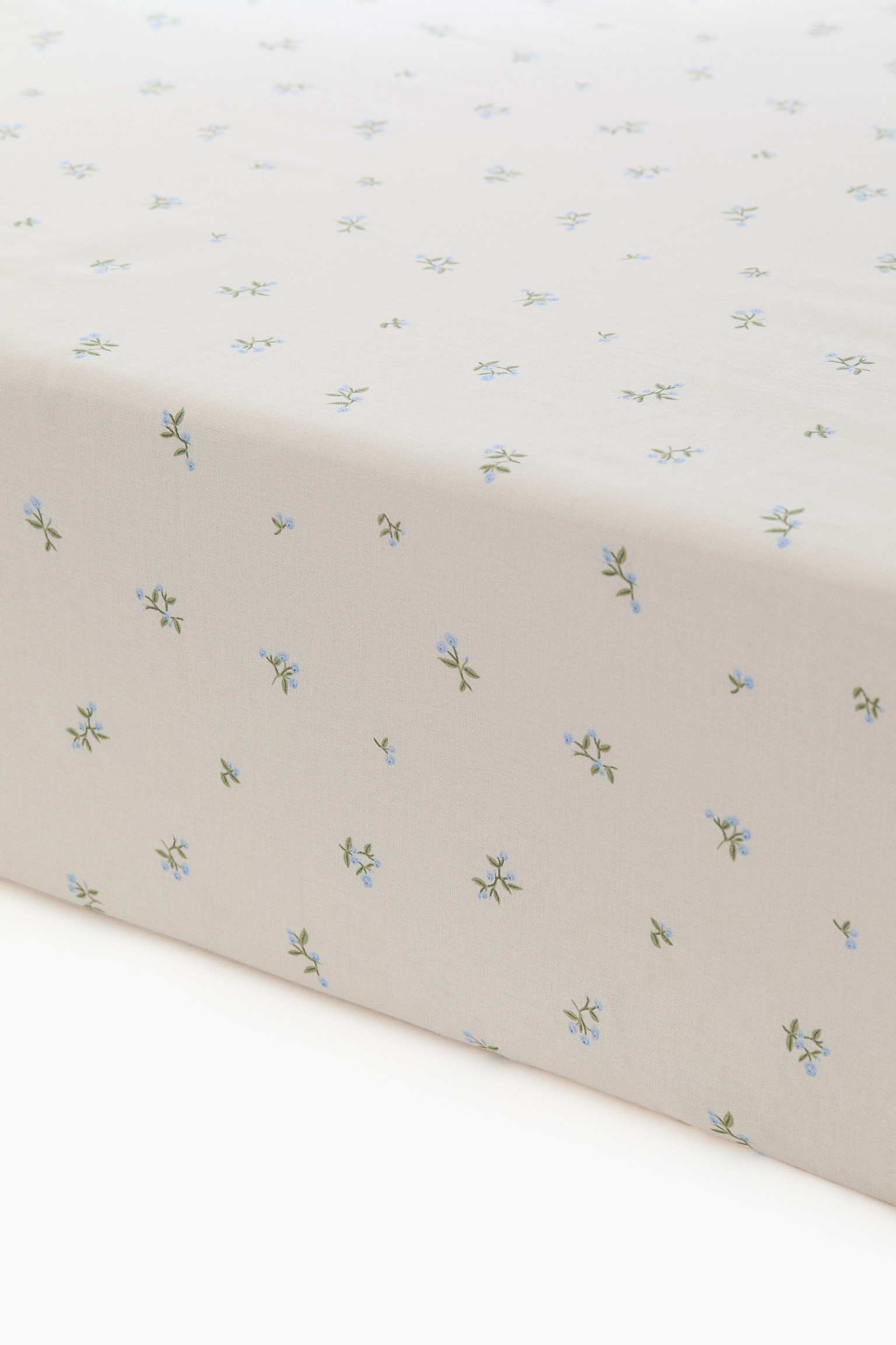 Patterned Cotton Fitted Sheet - Cream/floral/Light green/vehicles/White/cherries/Pink/floral/Light taupe/floral/Green/clover/White/dotted/Light beige/dinosaurs/Light pink/floral/Light blue/fish/Light beige/unicorns/Light yellow/oranges