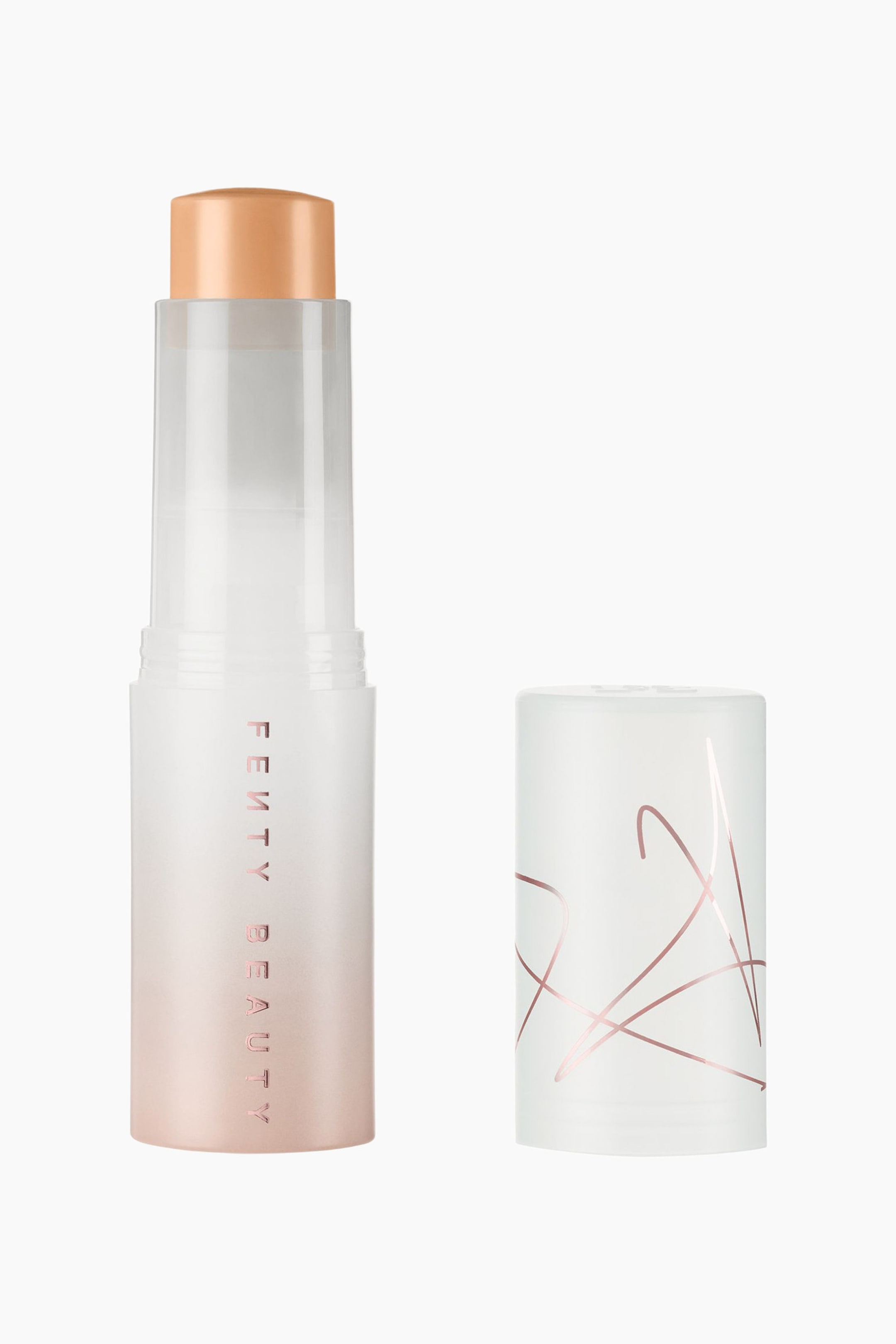 Visa större bild: Eaze Drop Blur + Smooth Tint Stick står upprätt och visar den avtagna, obehandlade krämstiften i en brunbeige nyans tillsammans med dess lösa lock. Den halvgenomskinliga, frostade behållaren tonar över i en roséguldfärgad gradient vid basen med vertikal varumärkesprofilering, medan det matchande locket står till höger och visar en abstrakt roséguldfärgad linjedesign.