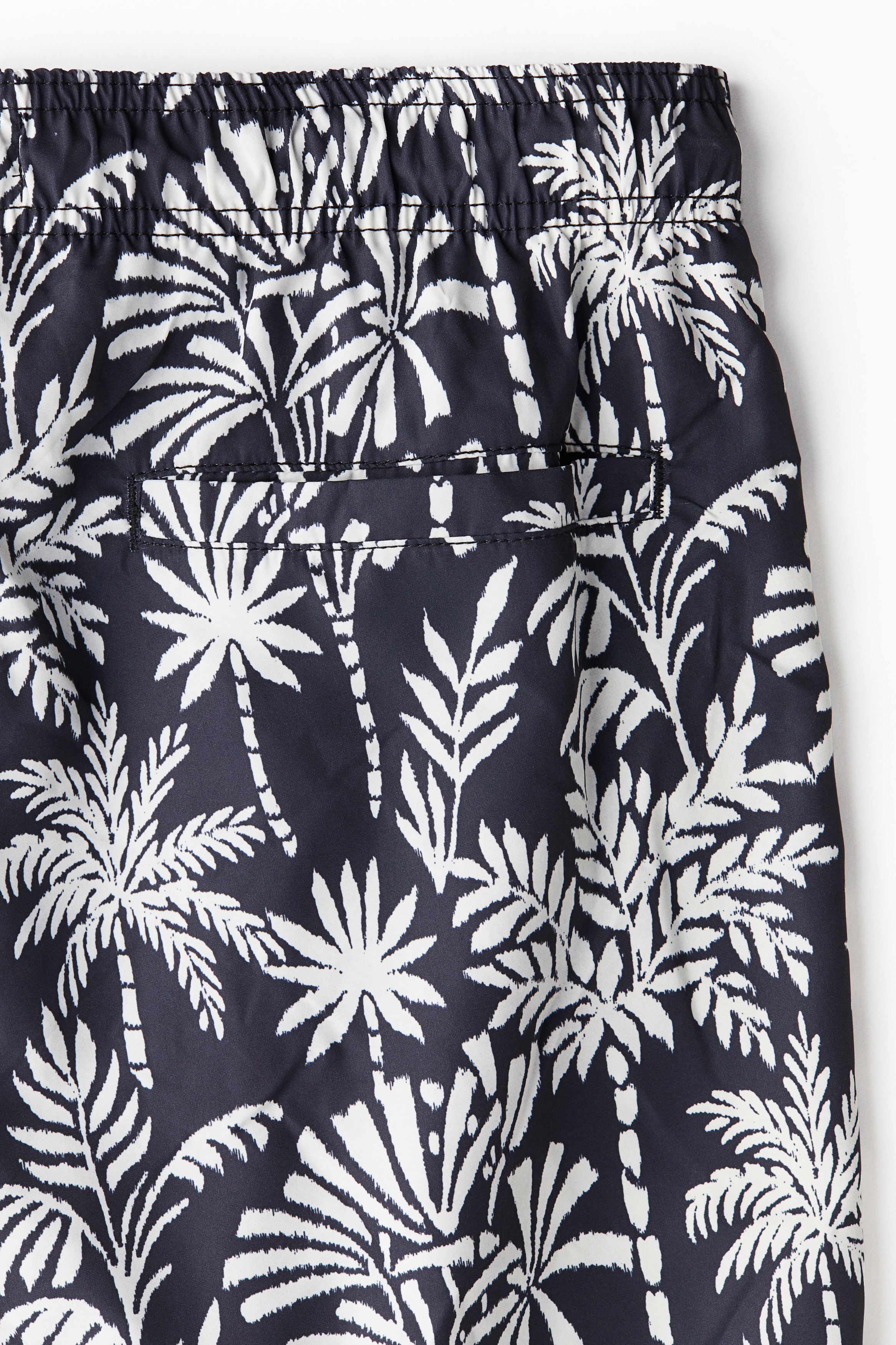 Patterned swim shorts