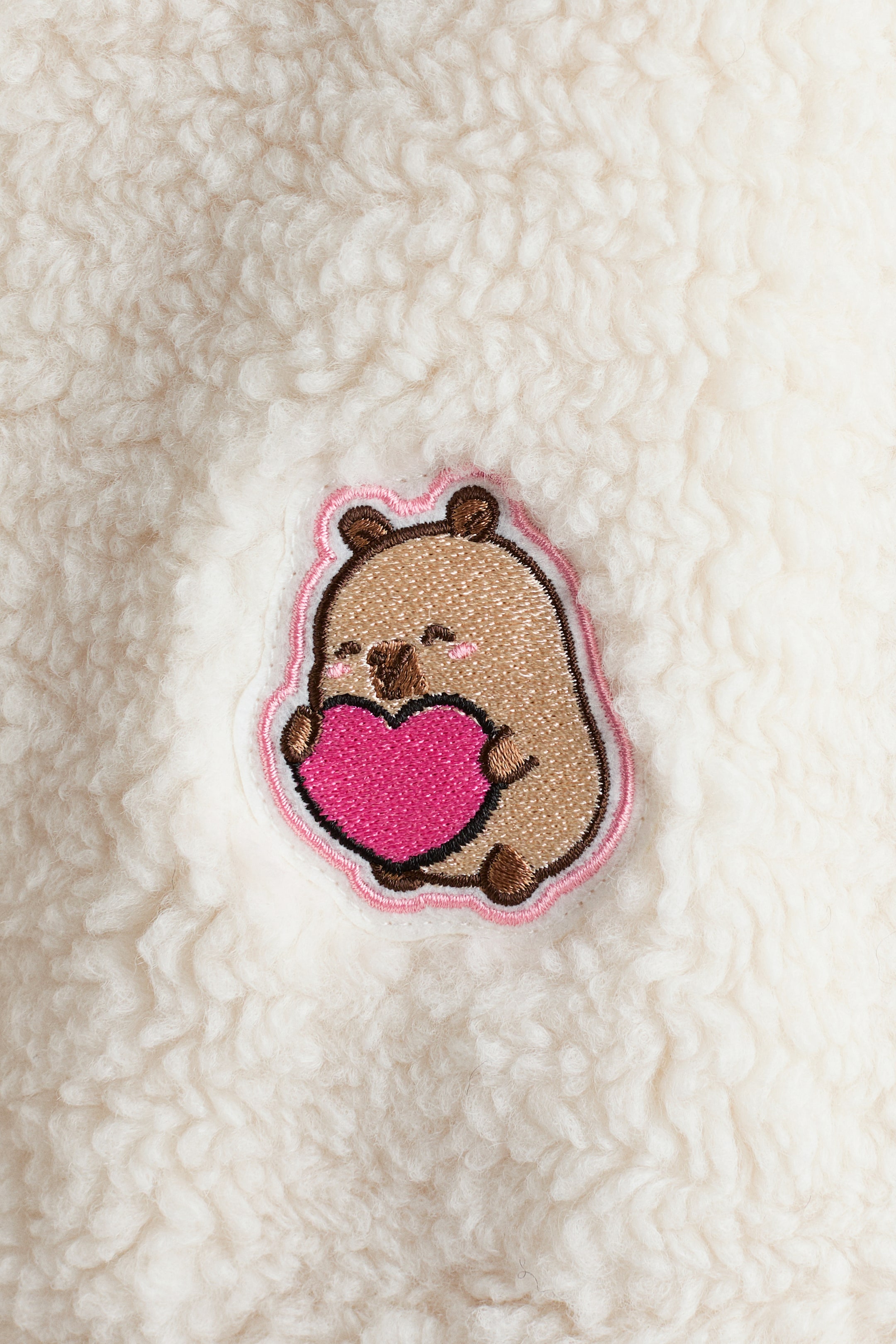 Veste en polar avec appliqués