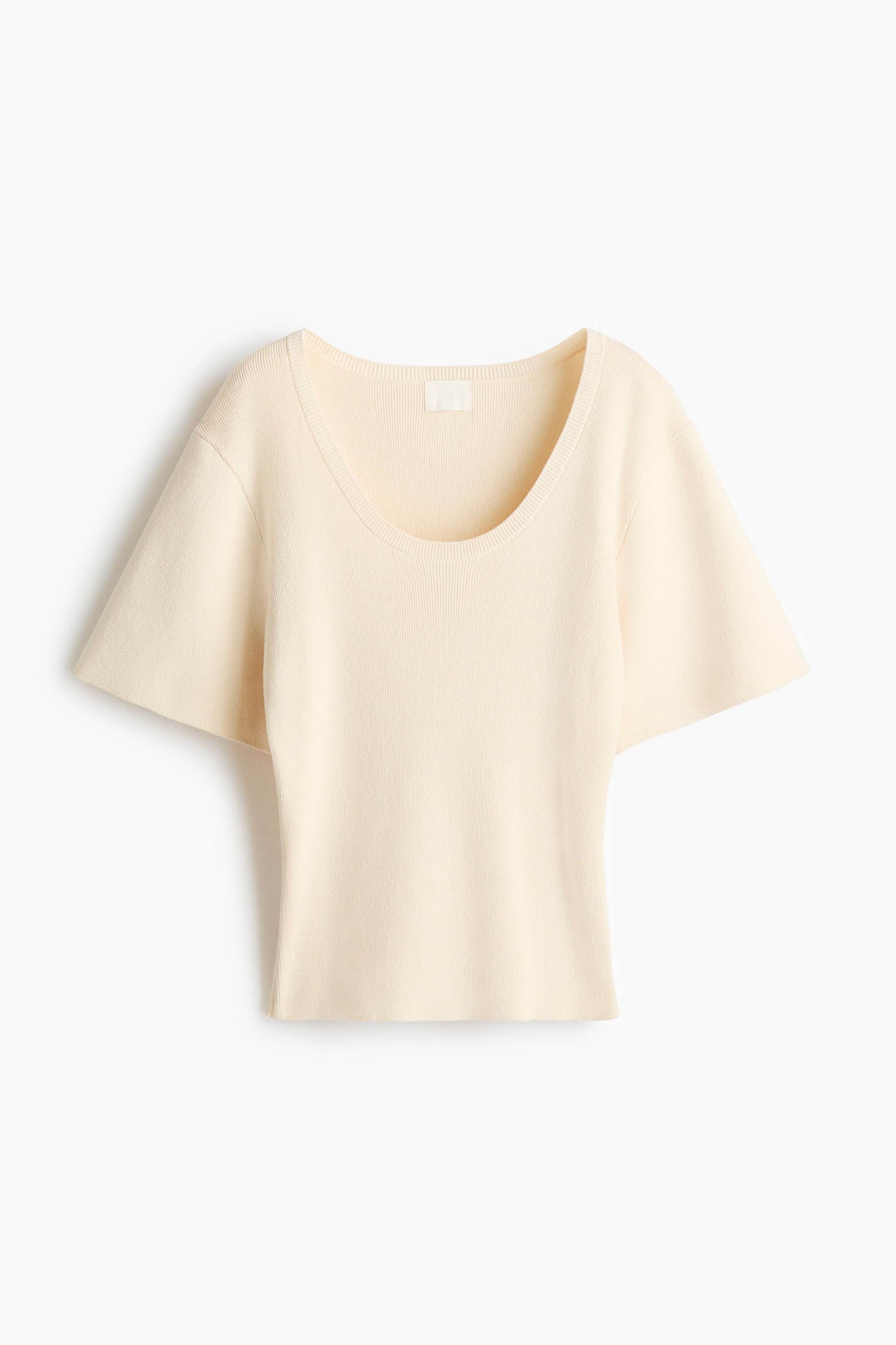 View larger image: A cream-colored, fitted t-shirt in a fine knit is presenting its front view, featuring a rib-trimmed scoop neckline, dropped shoulders, and short, wide sleeves.