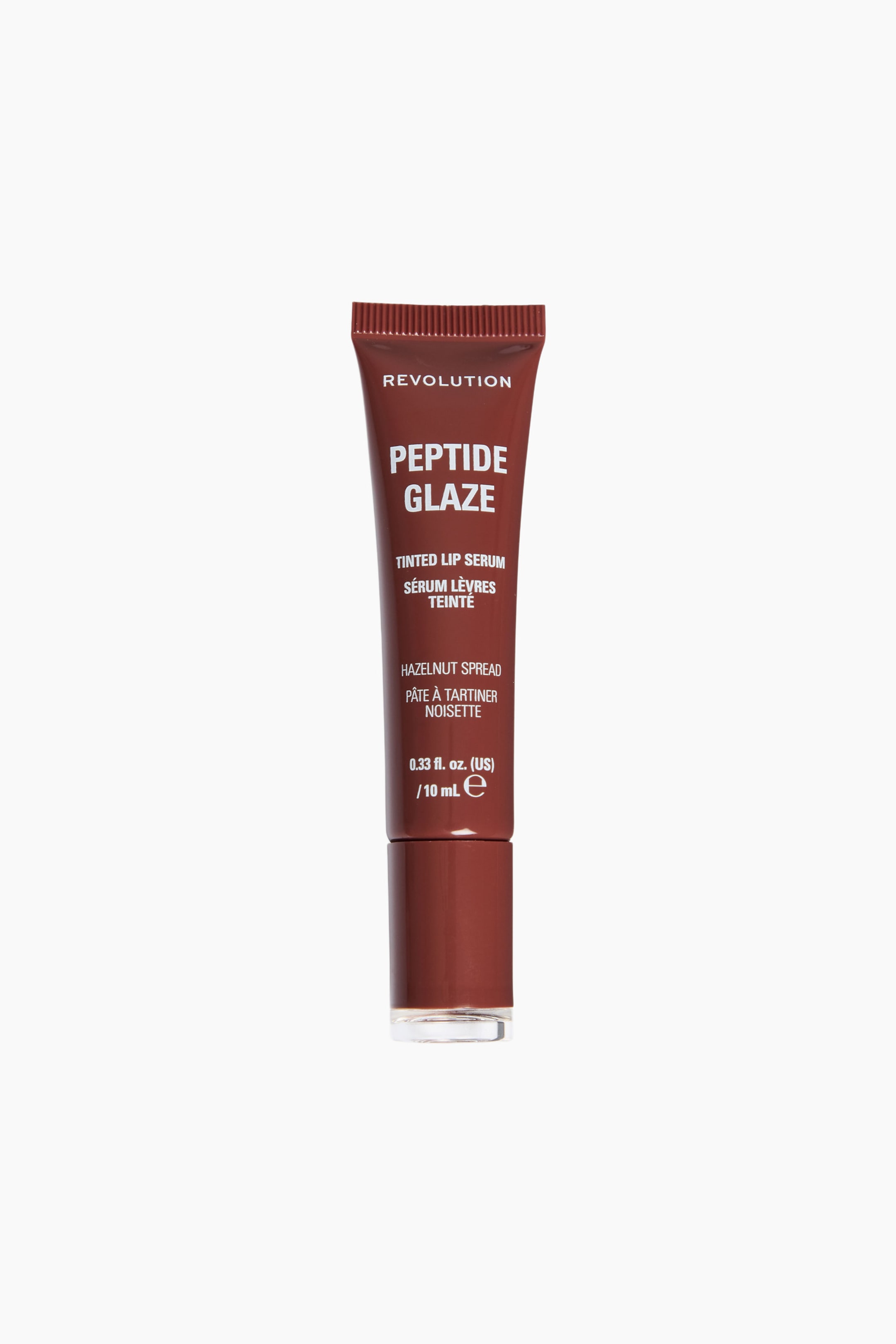 Visa större bild: Peptide Glaze Tinted Lip Serum står upprätt och vänt framåt, med en klämbar djupt rödbrun tub med ett matchande brunt lock i botten. Framsidan av tuben visar vittryckt text som inkluderar "REVOLUTION", "PEPTIDE GLAZE" och nyansen "HAZELNUT SPREAD".