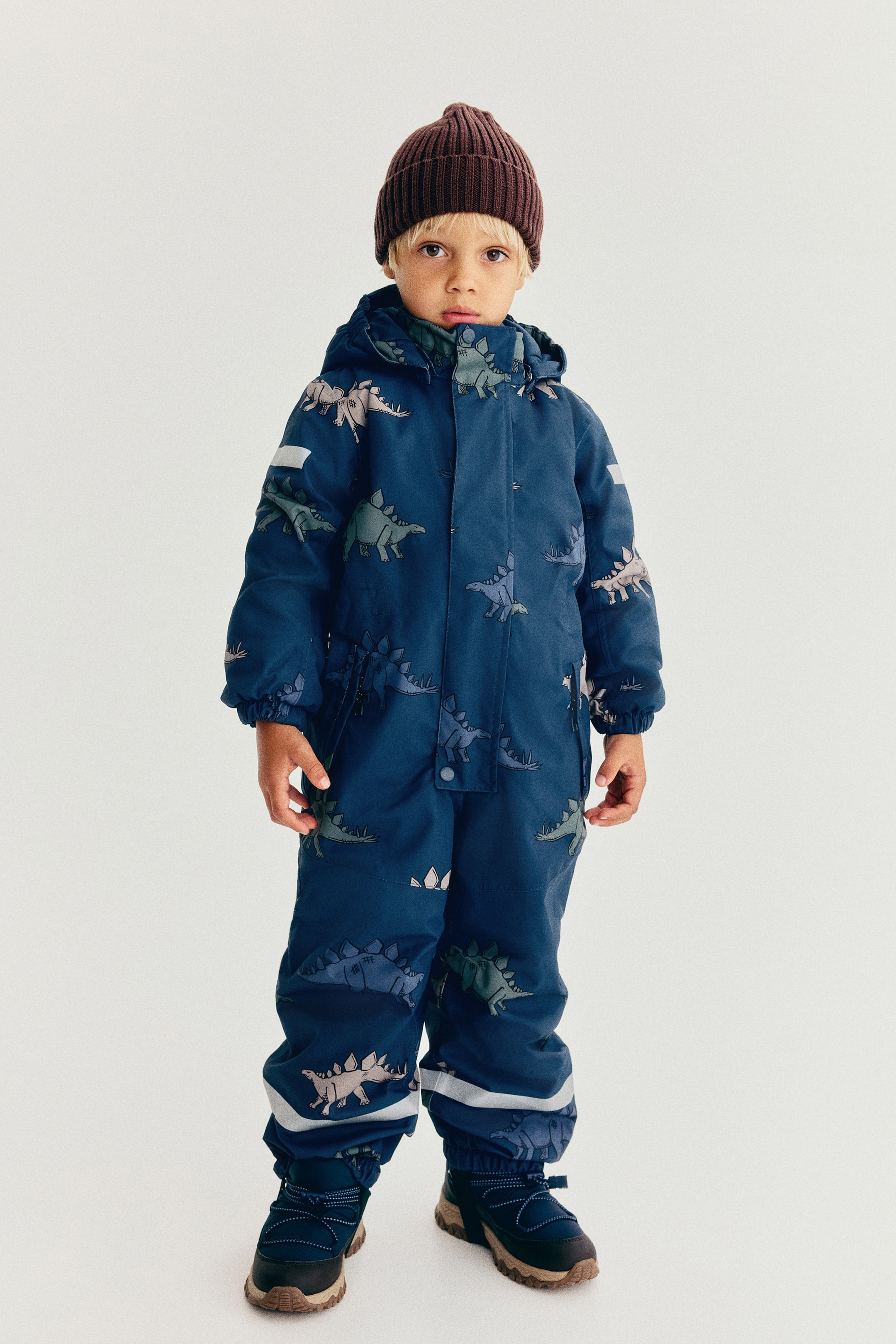View larger image: Waterproof room-to-grow snowsuit - Dark blue/Stegosaurus - Kids | H&M 1