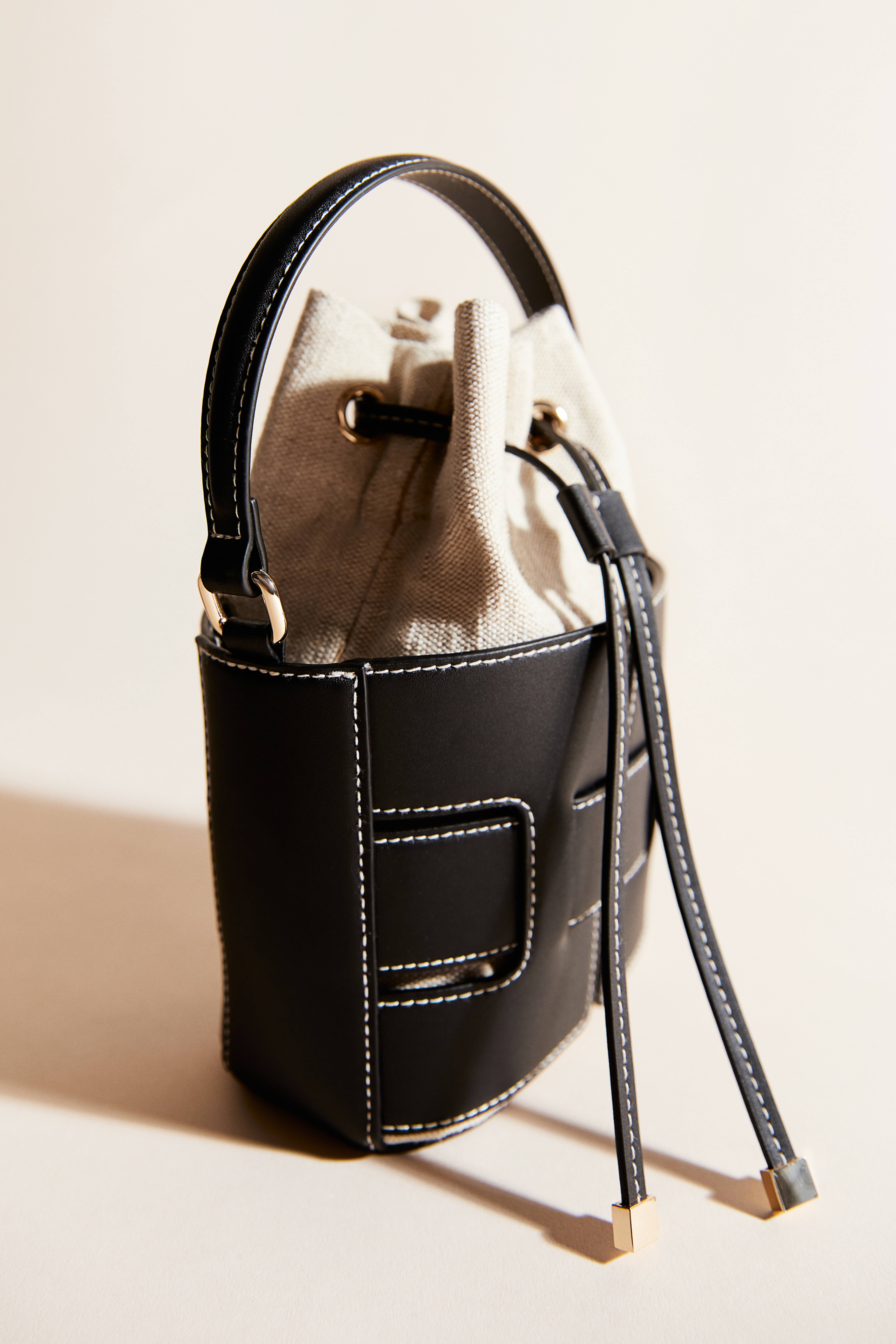 Black bucket bag crossbody hotsell