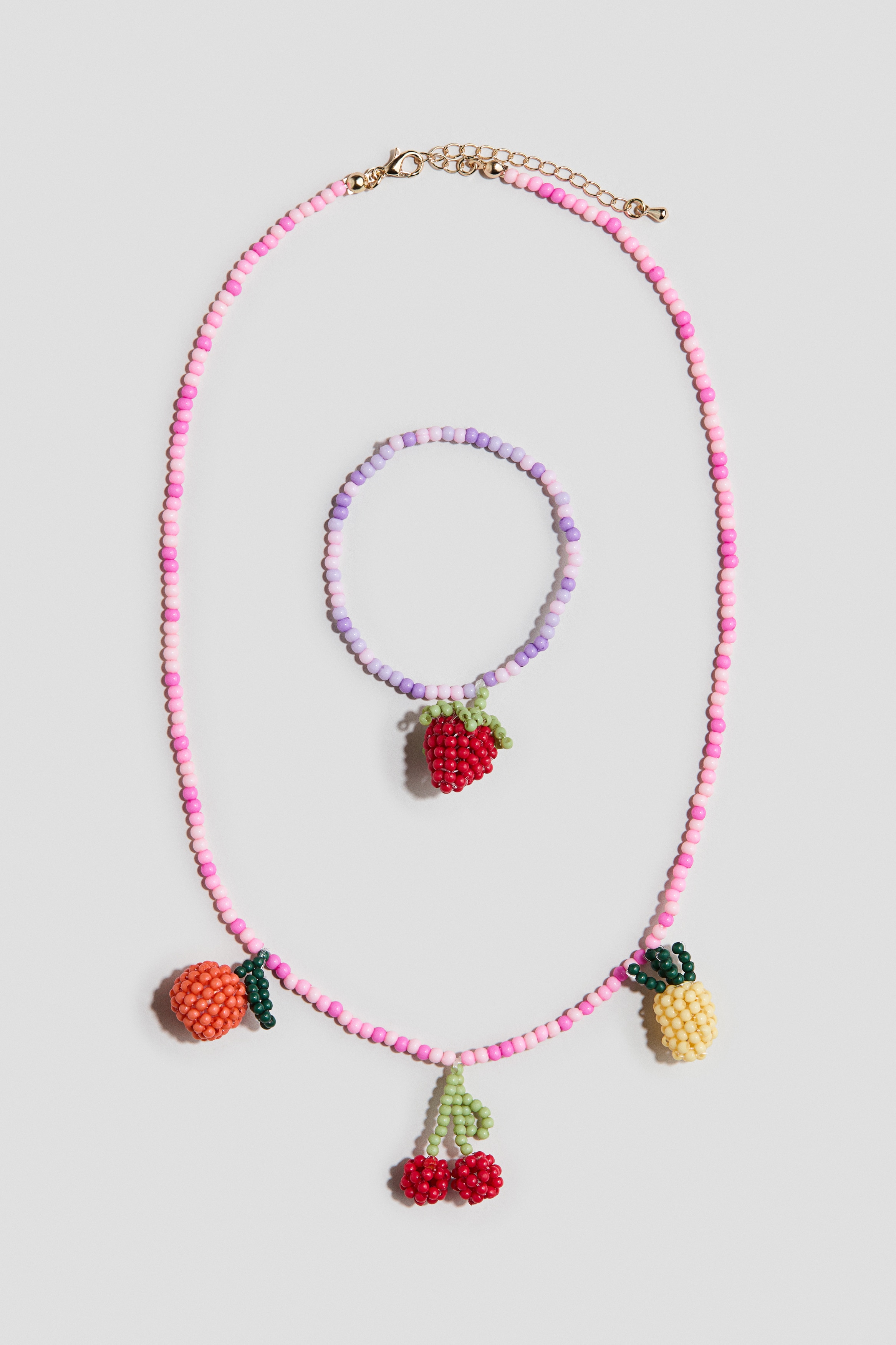 Conjunto de 2 peças de bijutaria com contasModelo