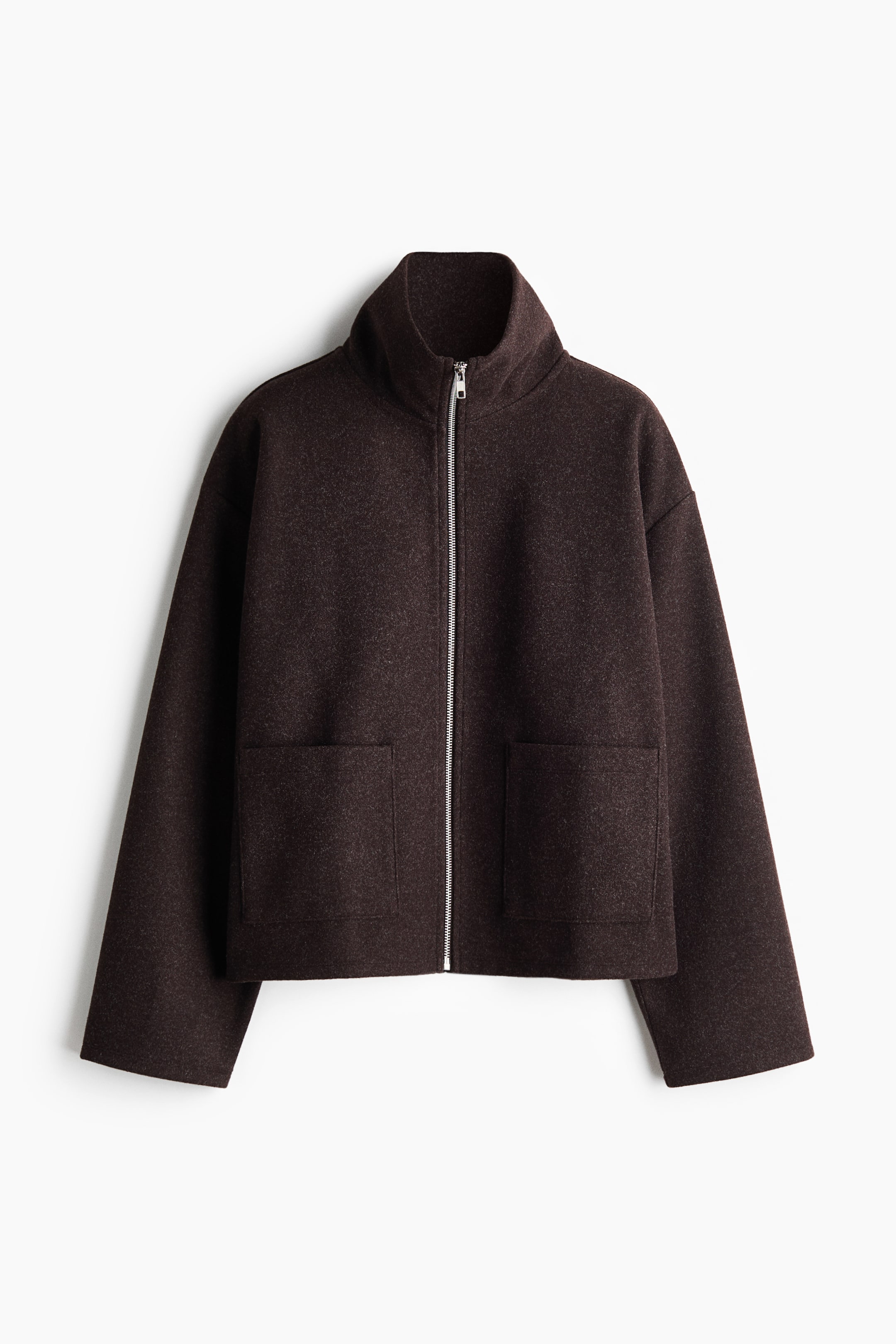 View larger image: A dark brown jacket is shown from the front, featuring a high stand-up collar and a central silver-tone zipper closure. The jacket has a boxy silhouette with dropped shoulders, wide sleeves, and two large square patch pockets on the lower front.