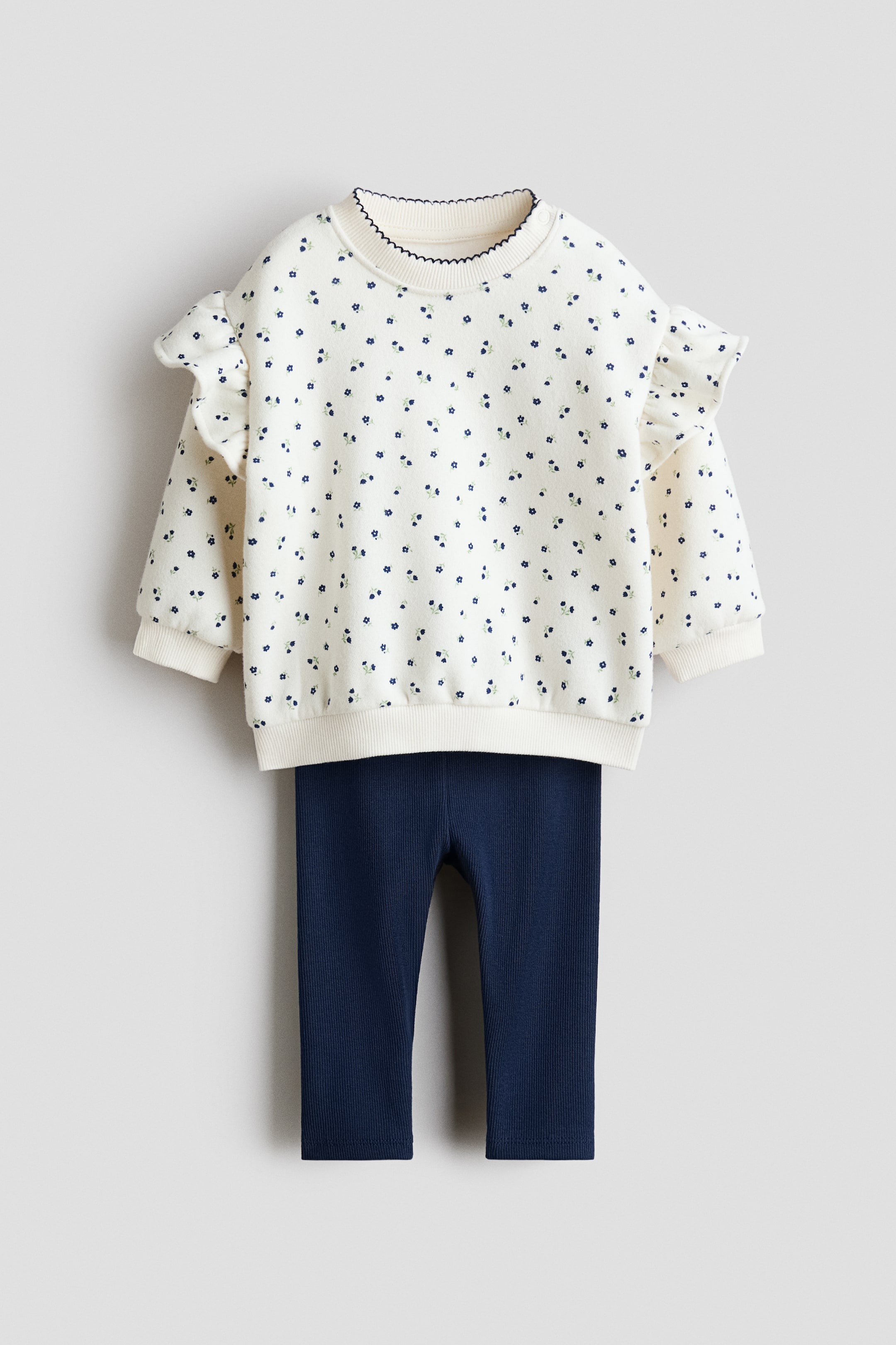 Переглянути збільшене зображення: Комплект із 2 виробів зі світшотом і легінсами - Темно-синій/квітчастий - Kids | H&M UA 1