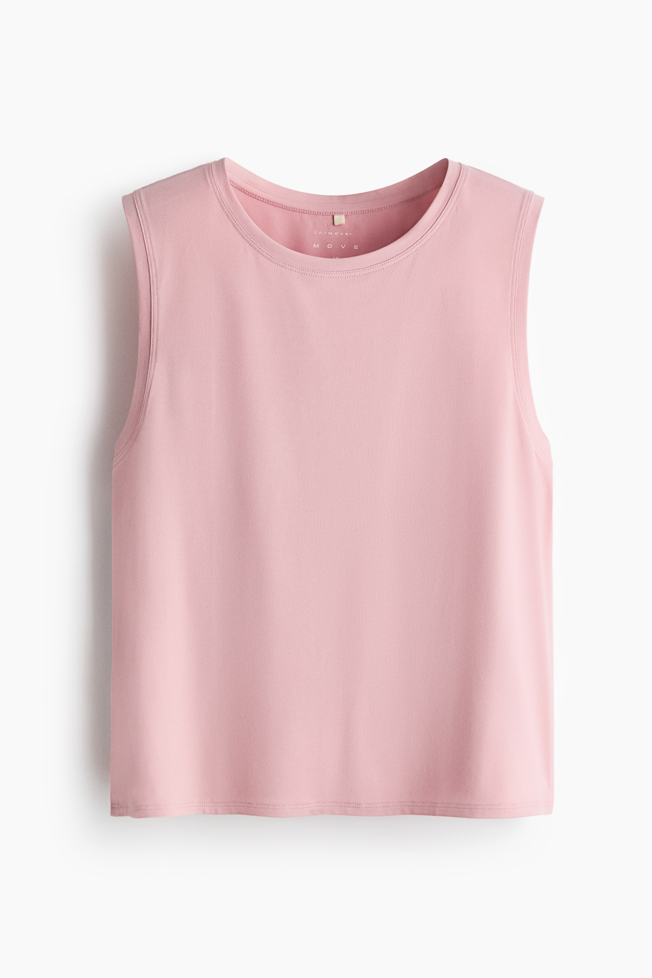 View larger image: A pink, boxy-style sports vest top shown from the front, featuring a round ribbed neckline and ribbed armholes. The top has a straight hem and the 'DRYMOVE' label visible on the inside of the neck.