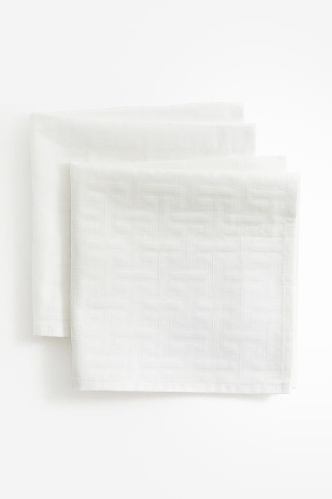 Lot de 2 serviettes de table tissées jacquard - Blanc/motif - 2