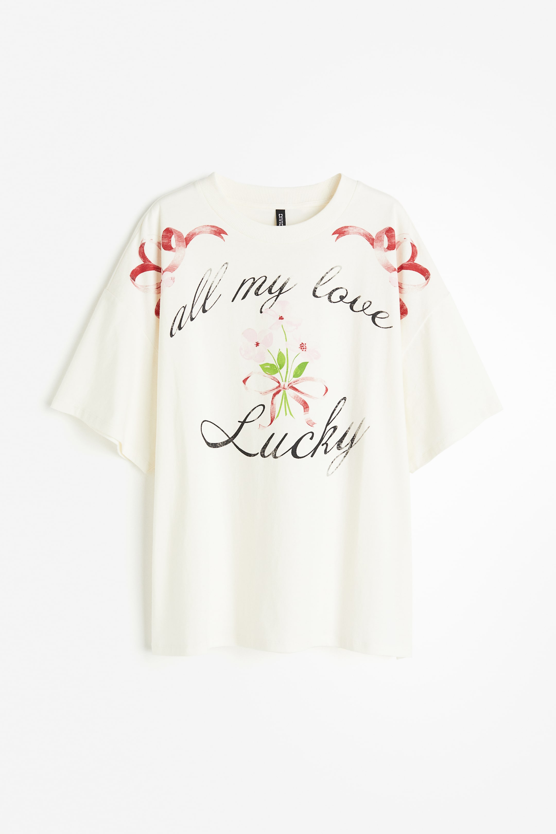 View larger image: Oversized printed T-shirt - Cream/Lucky - Ladies | H&M IN 1