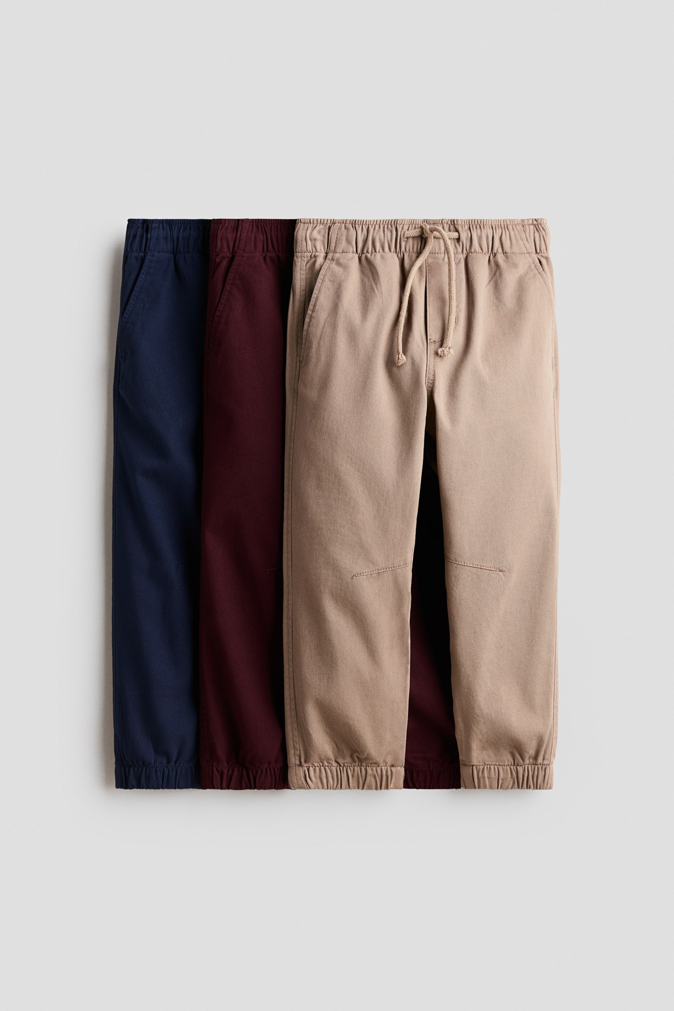 View larger image: 3-pack cotton twill joggers - Navy blue/Dark red/Beige - Kids | H&M 1
