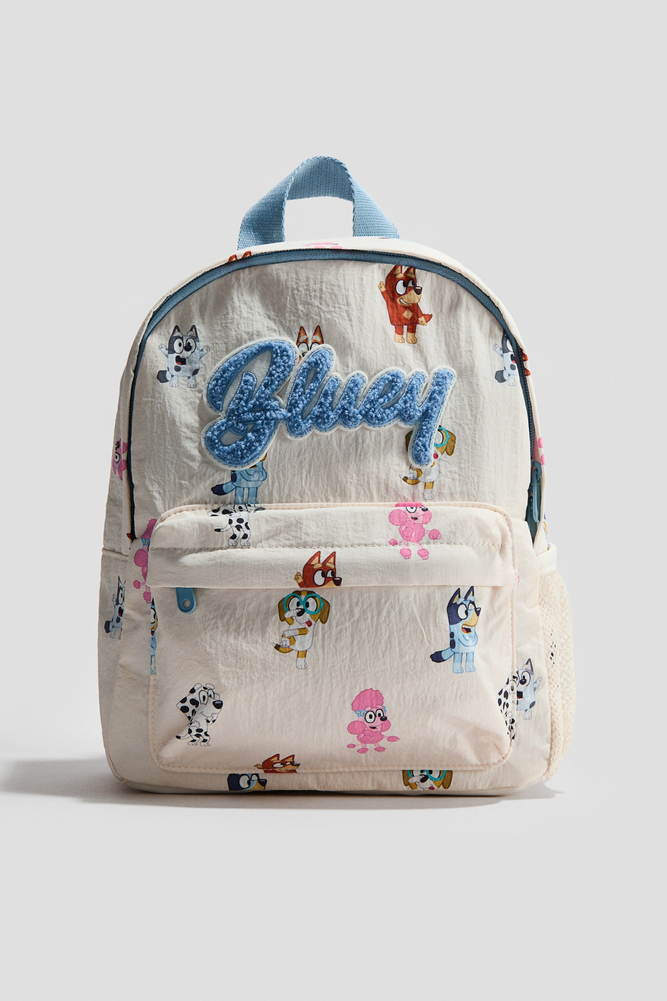 Ampliar la imagen: Mochila con aplicaciones - Blanco/Bluey - Kids | H&M MX 1