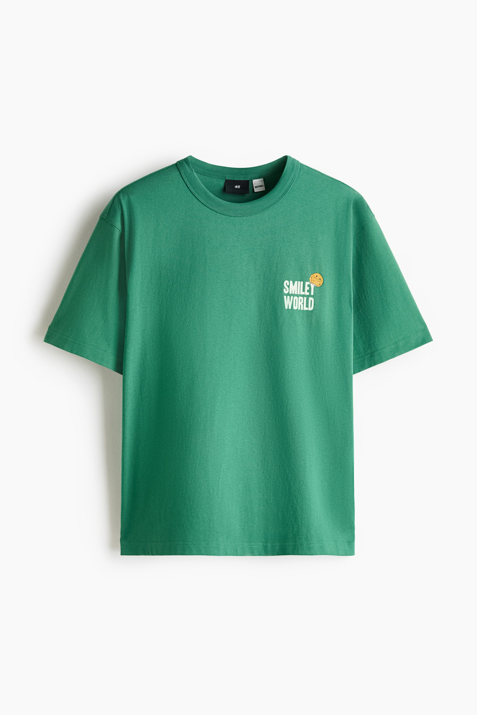 ルーズフィット プリントコットンTシャツ - グリーン／SmileyWorld®/ホワイト／SmileyWorld®/ダークブラウン／SmileyWorld®/ライトピンク／SmileyWorld® - 1