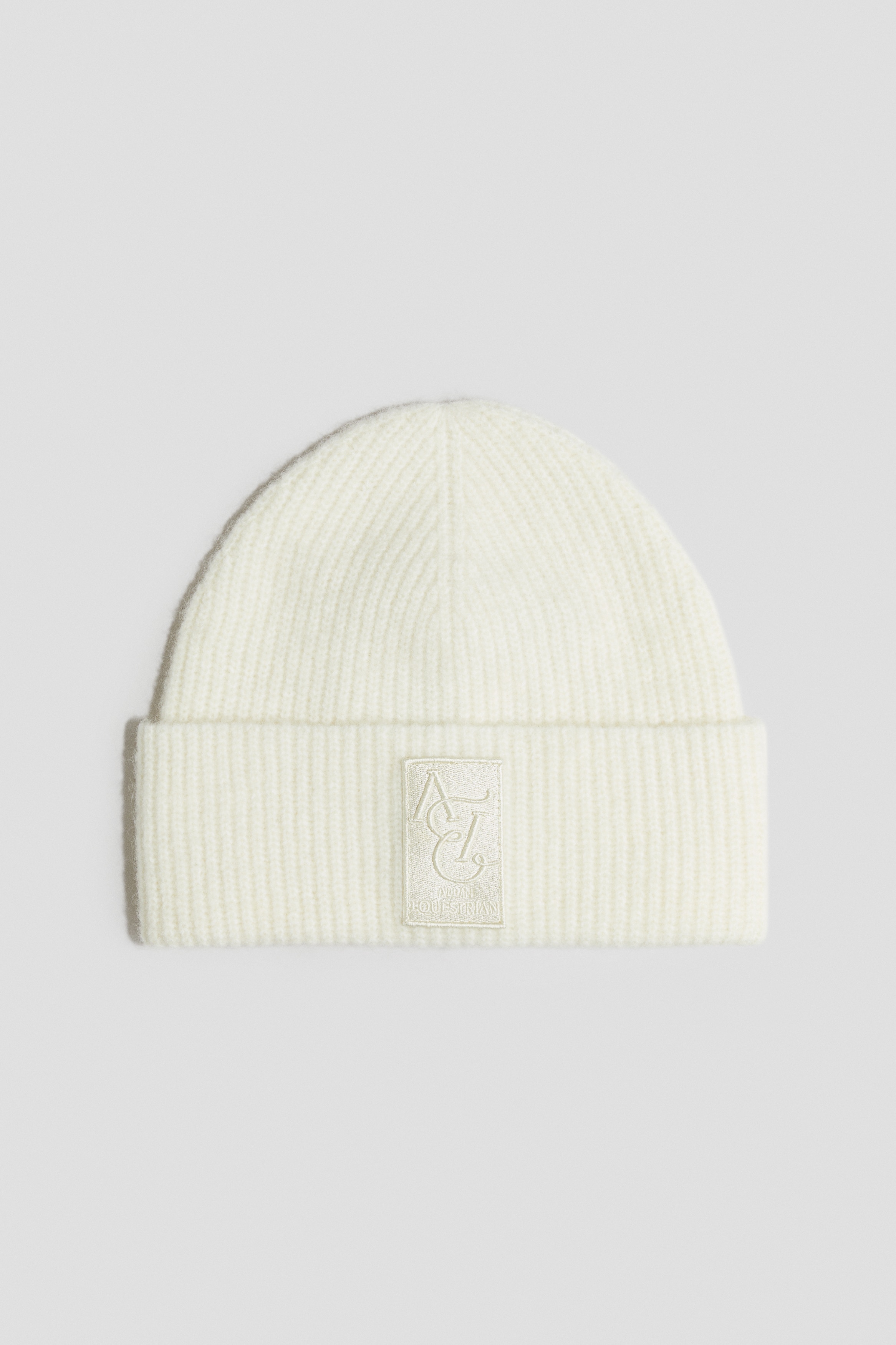 Ribbestrikket lue i alpakkamiks - Hvit/Sort