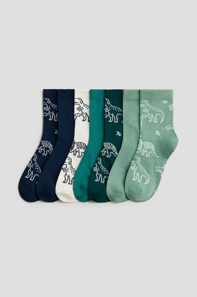 Set de 7 perechi de șosete - Verde/dinozauri/Bleumarin/zilele săptămânii/Albastru/dinozauri/Alb/mâncare/Albastru-închis/burgeri/Alb/minge de fotbal/Gri/mașini/Verde/tigri/Alb/teckel/Verde/mașini/Albastru/mingi de fotbal/Negru/Gaming/Gri-deschis melanj/vehicule/Verde/urși - 1