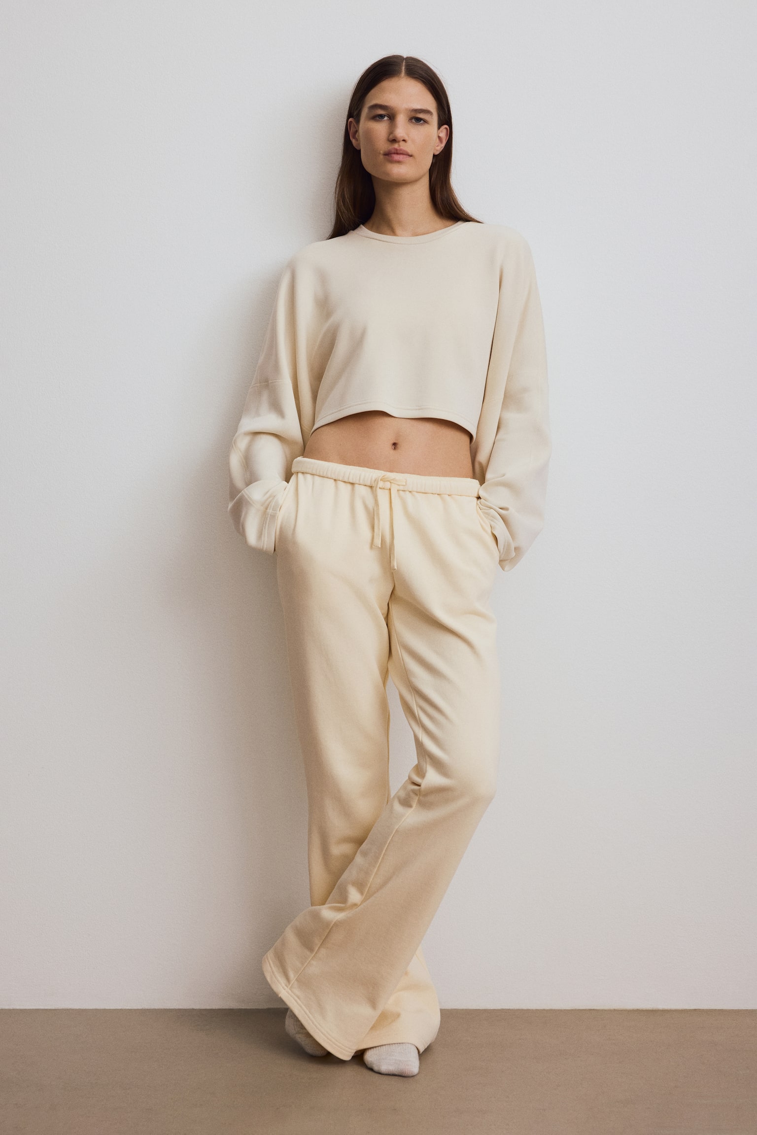 Flared sports sweatpants - Light apricot/Dusty pink - 1