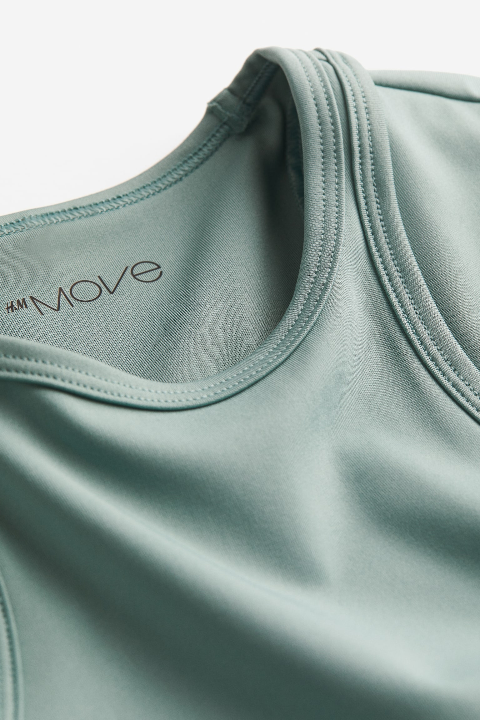 Open-back sports top in DryMove™ - Light teal/Black - 3