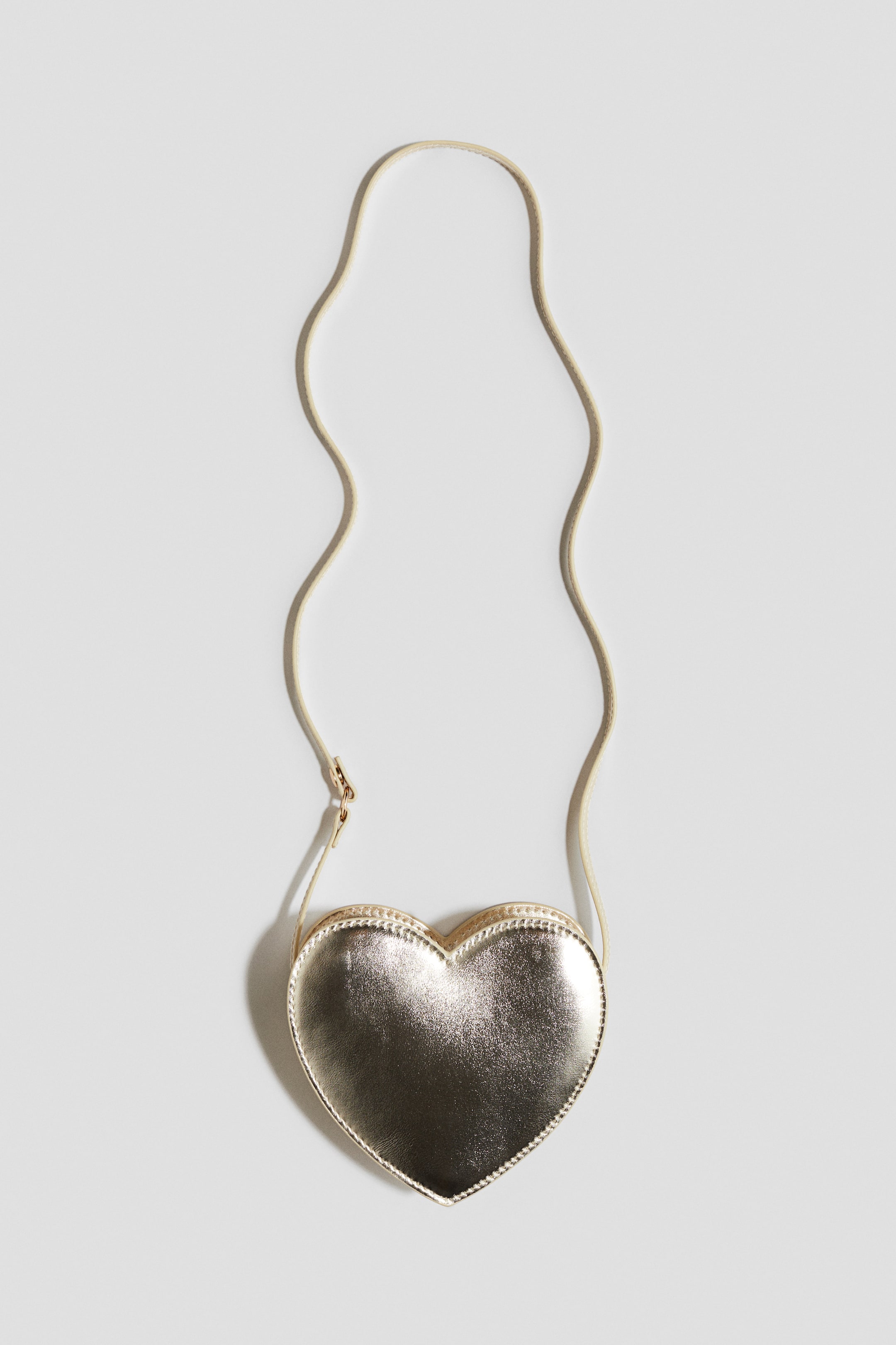 View larger image: Heart-shaped crossbody bag - Gold-coloured - Kids | H&M IN 1