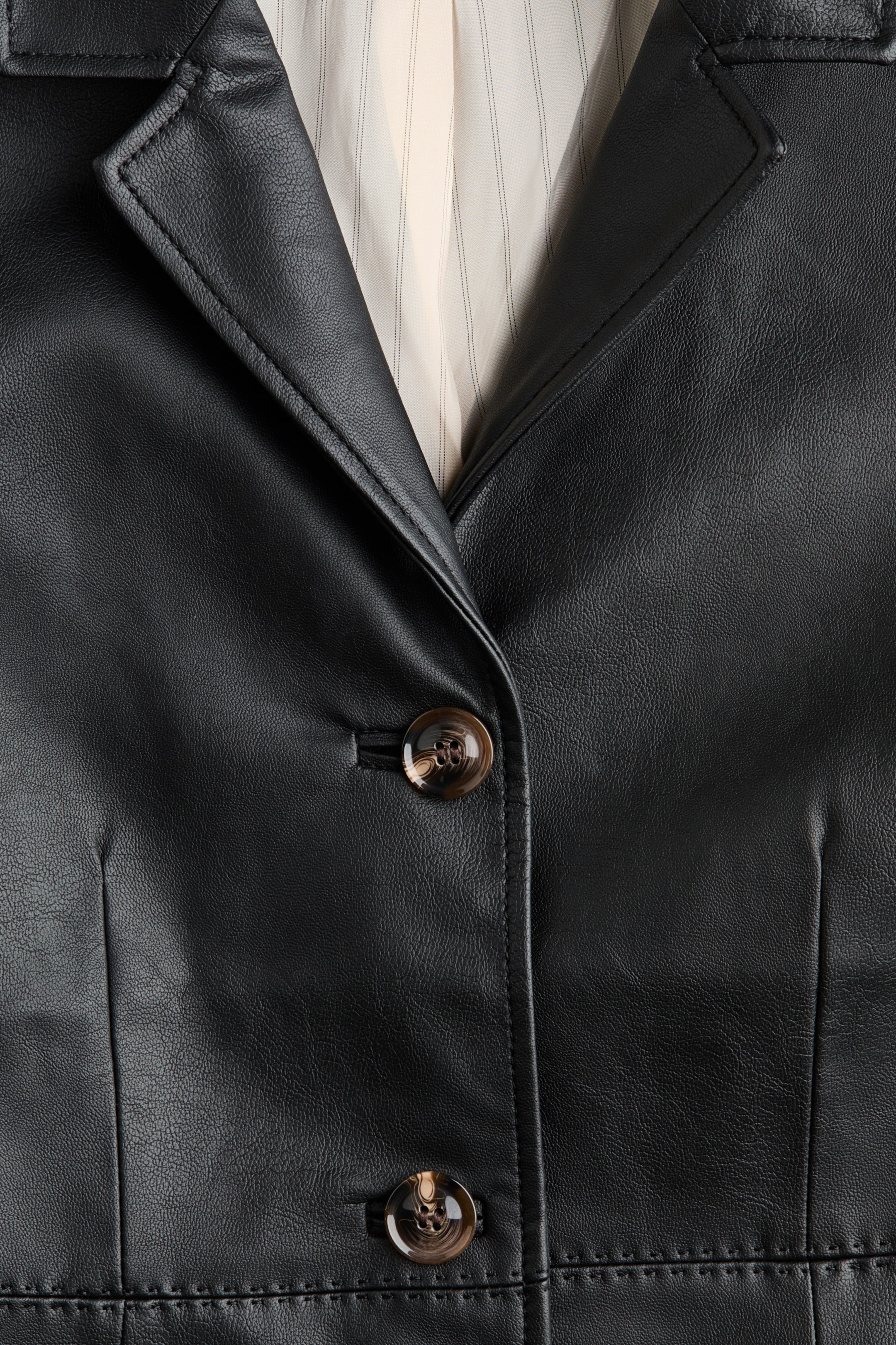 Veste en tissu enduit