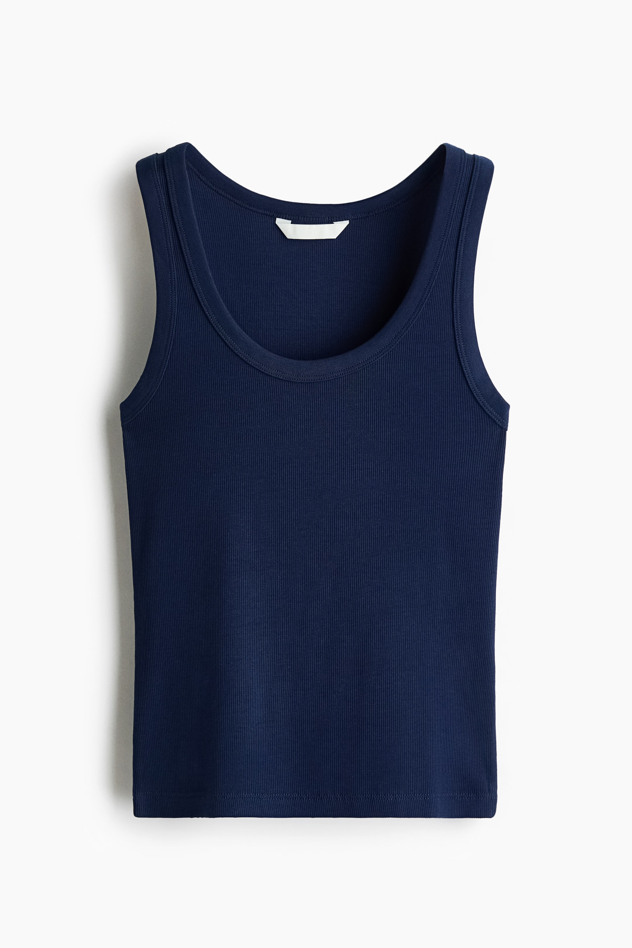 View larger image: A navy fitted ribbed cotton-jersey vest top is shown from the front, featuring a round neckline and wide shoulder straps.