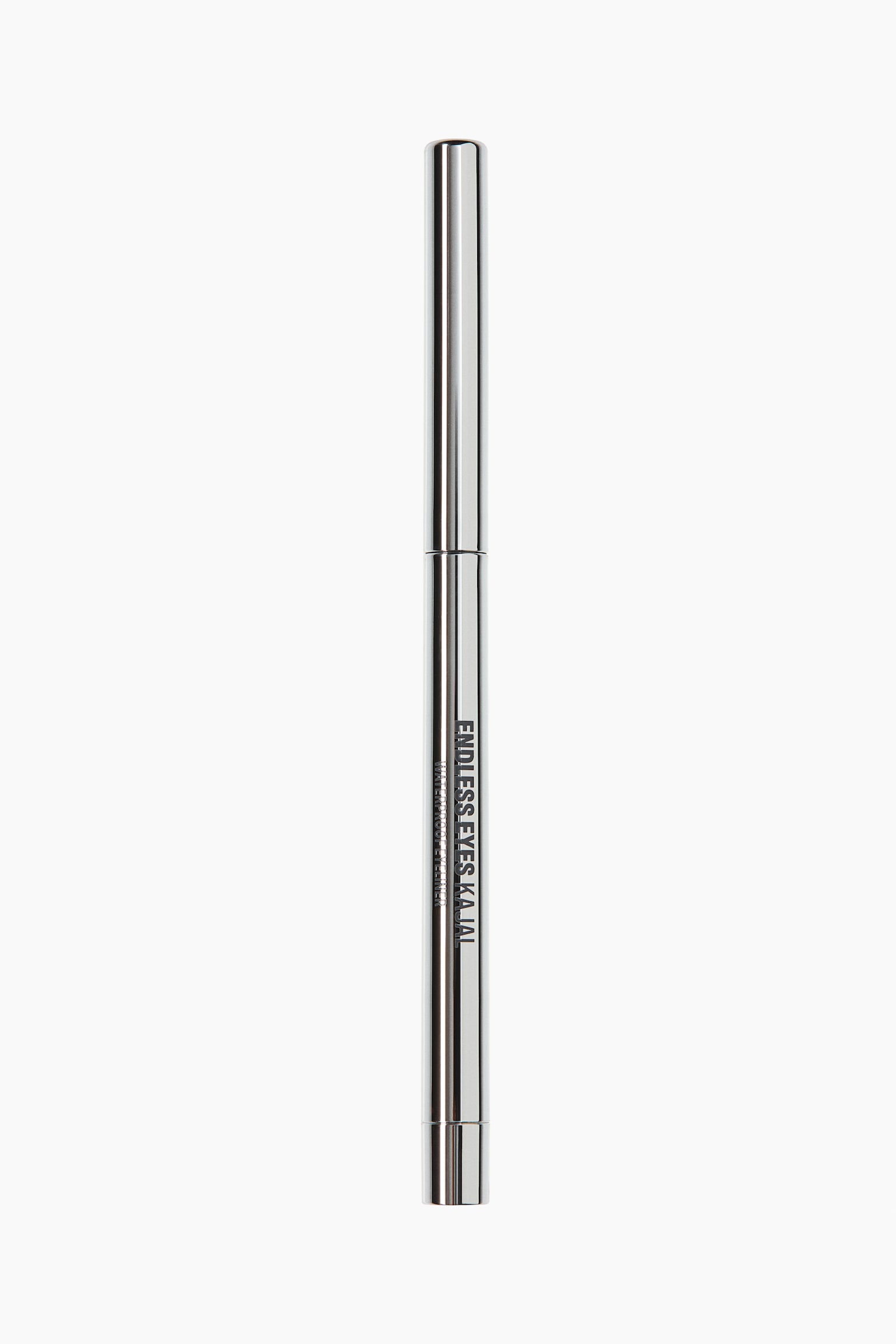 A sleek, metallic silver kajal eyeliner pencil stands vertically, showcasing its front-facing design. The reflective, chrome-finished cylindrical body features black vertical text that reads "ENDLESS EYES KAJAL" and "WATERPROOF EYELINER."