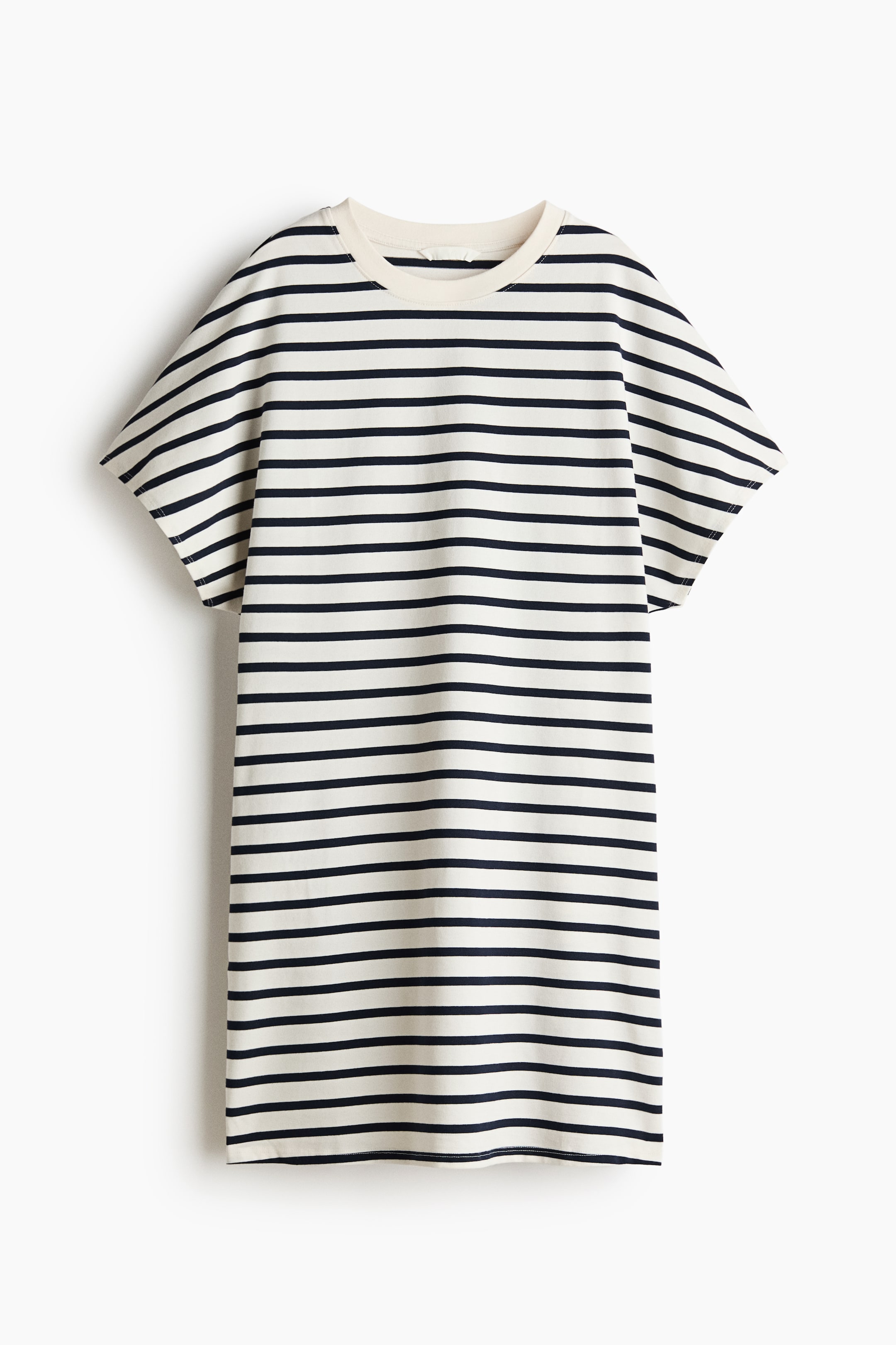 View larger image: A front-facing t-shirt dress showcases horizontal navy and cream stripes. It features a round neckline and short sleeves, presenting a relaxed, straight fit.