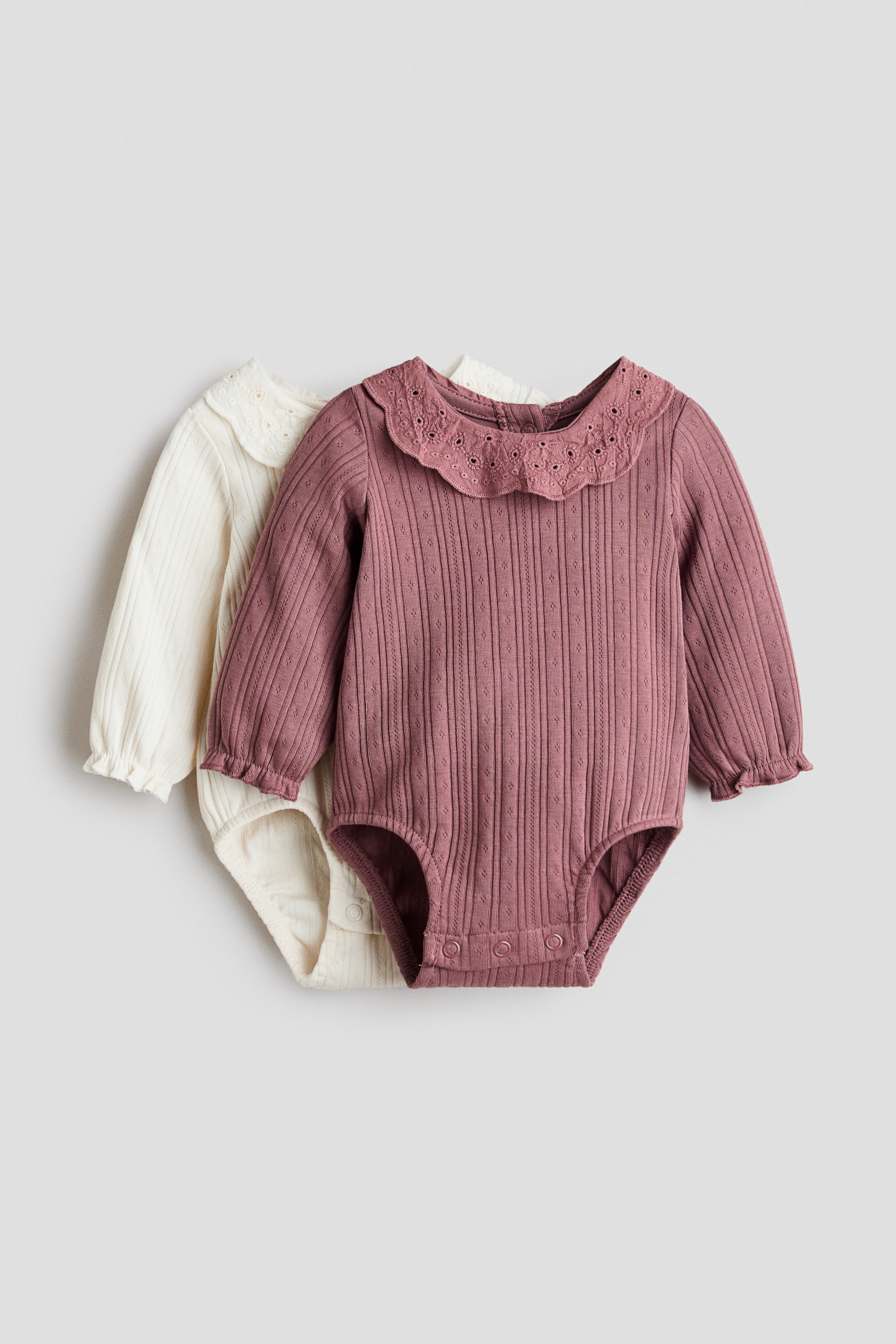 View larger image: 2-pack cotton bodysuits - Cream/Dusty pink - Kids | H&M 1