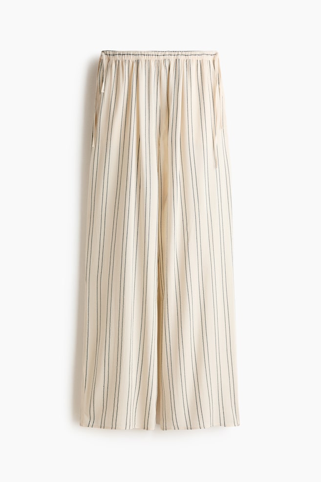 Weite Hose mit Kordelzug - Hellbeige/Blau gestreift - 1