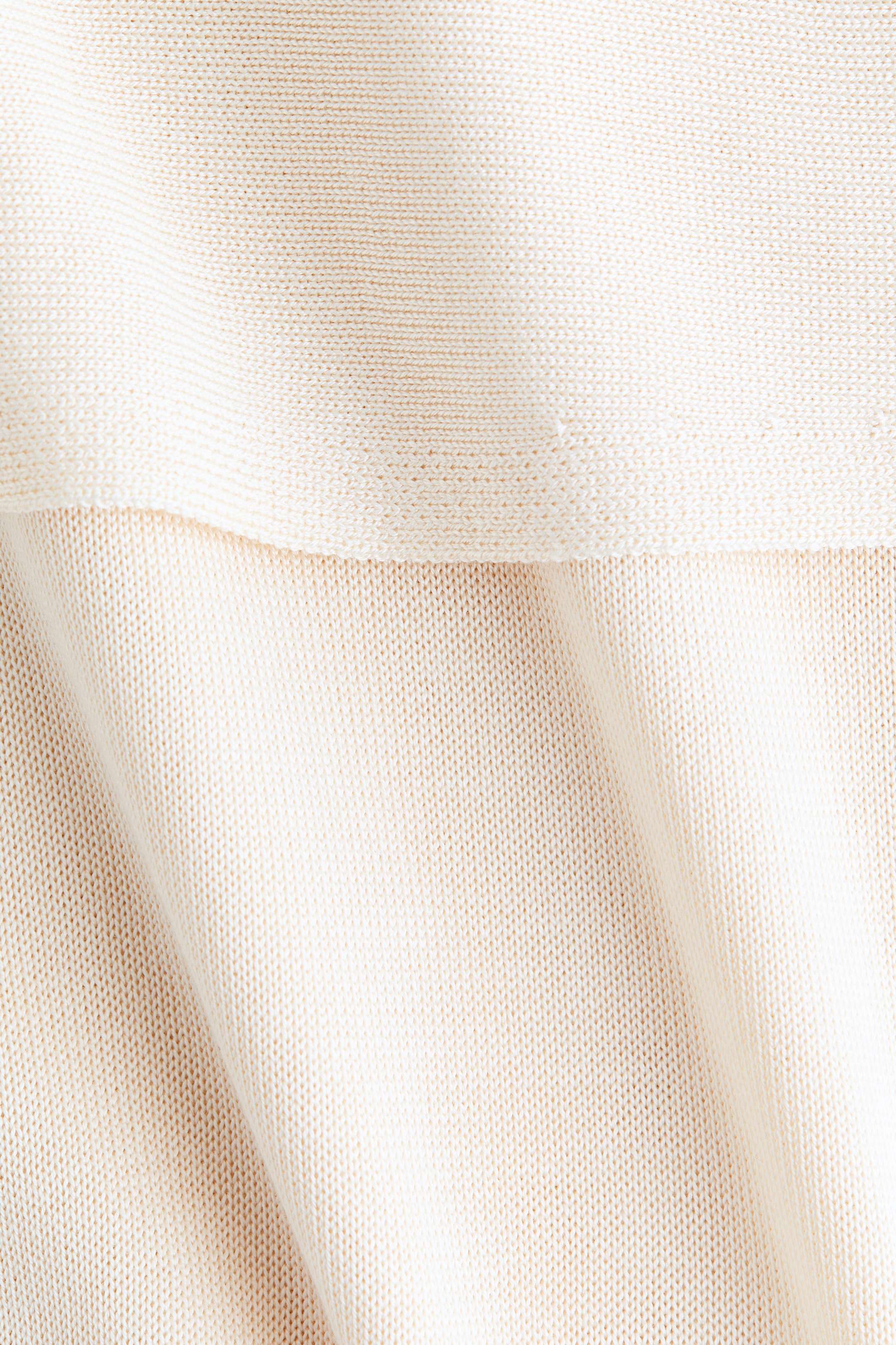 Haut cape en fin tricot